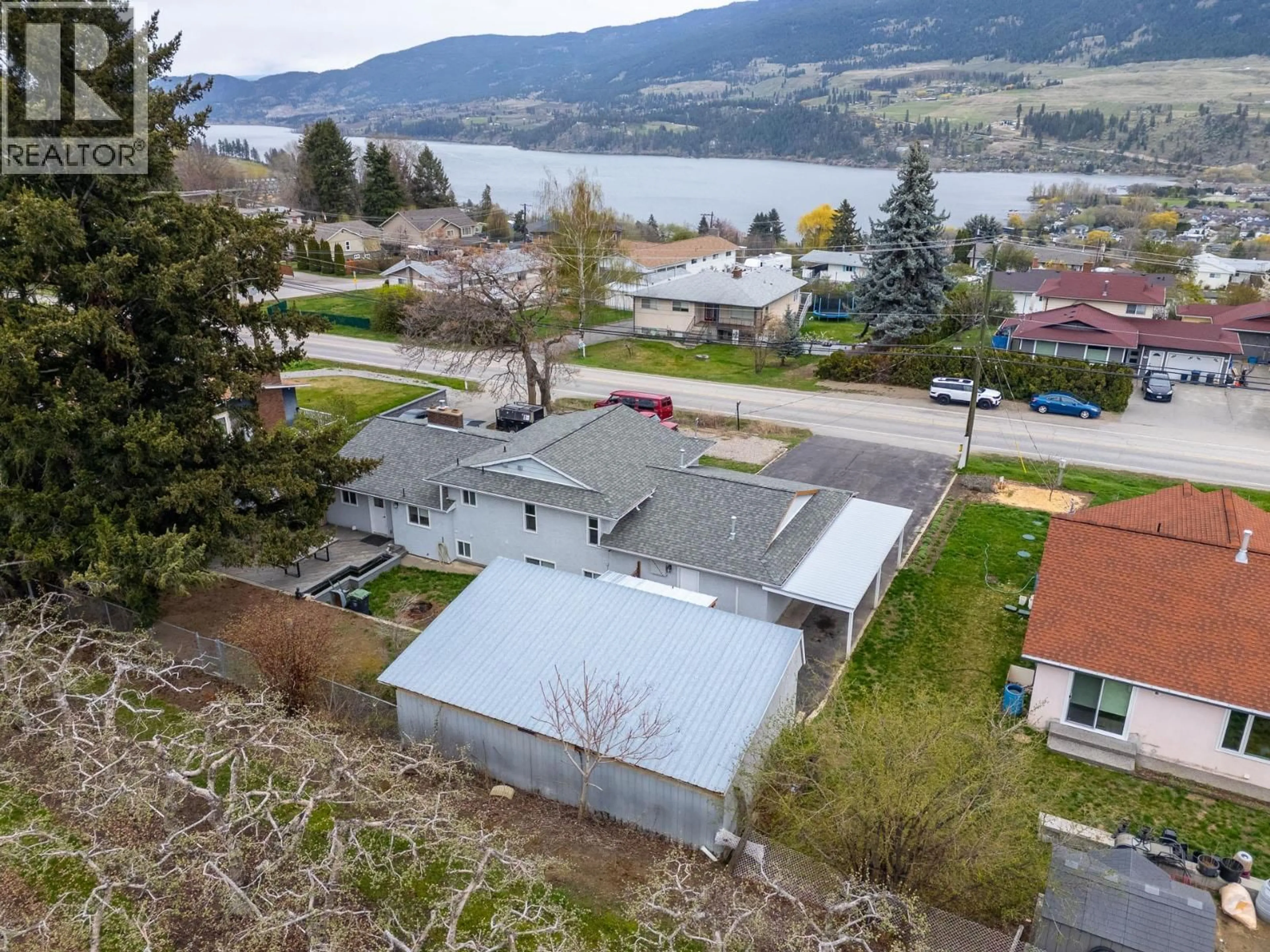 A pic from outside/outdoor area/front of a property/back of a property/a pic from drone, water/lake/river/ocean view for 11438 OKANAGAN CENTRE ROAD EAST, Lake Country British Columbia V4V1G7