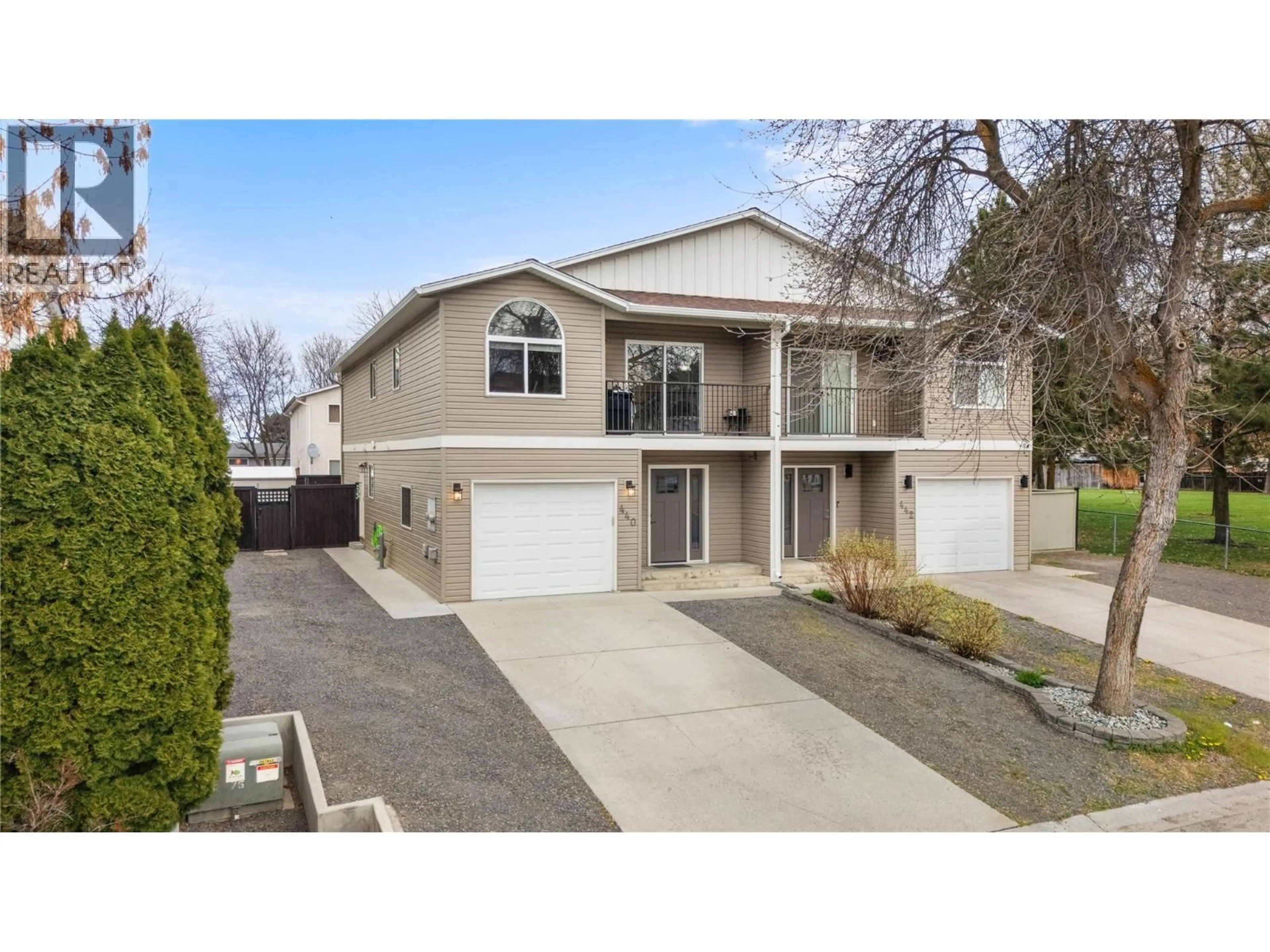 Home with vinyl exterior material, street for 440 WIGGLESWORTH CRESCENT, Kelowna British Columbia V1X7N1