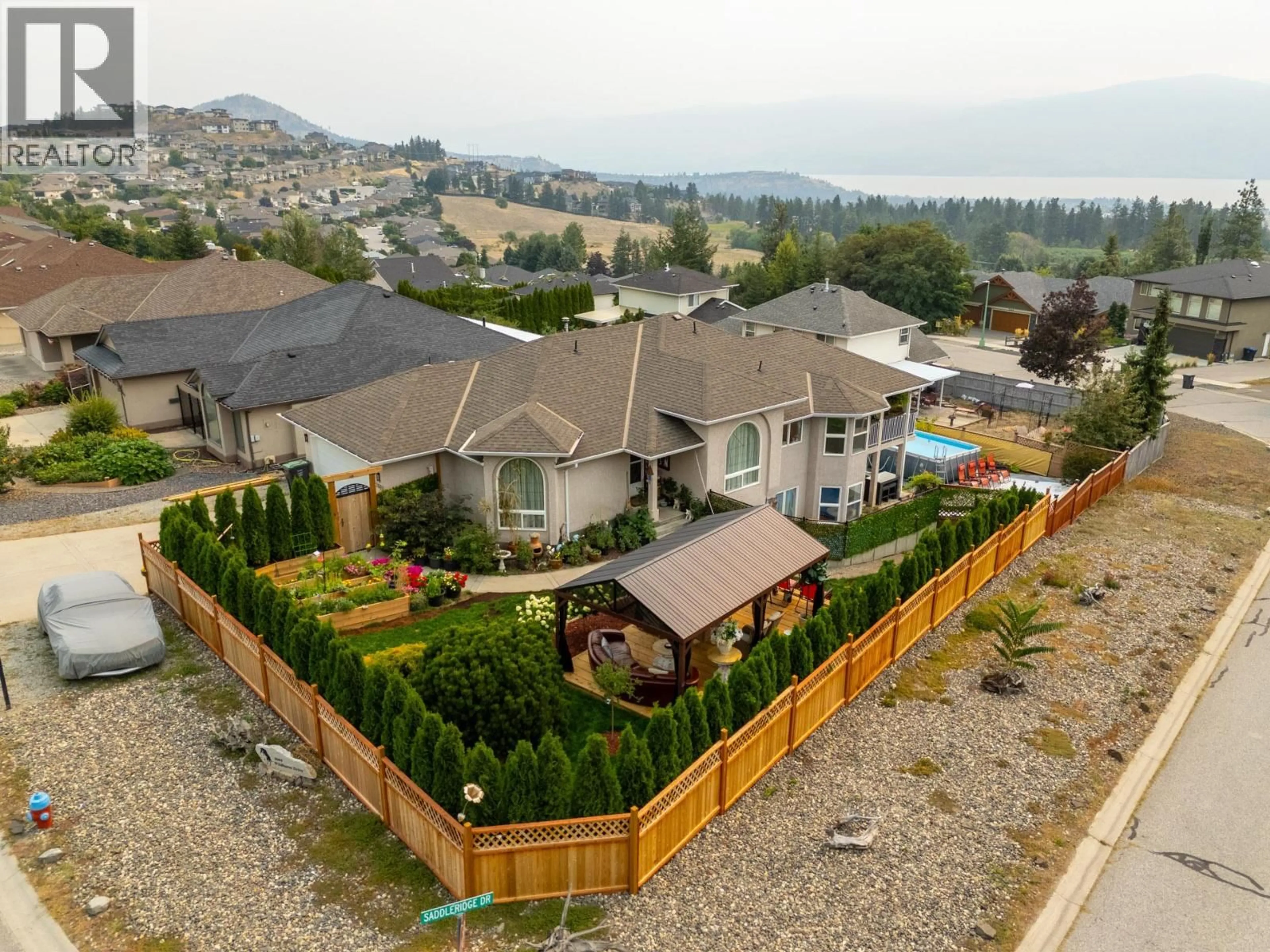 A pic from outside/outdoor area/front of a property/back of a property/a pic from drone, mountain view for 2669 WILD HORSE DRIVE, West Kelowna British Columbia V4T2K8