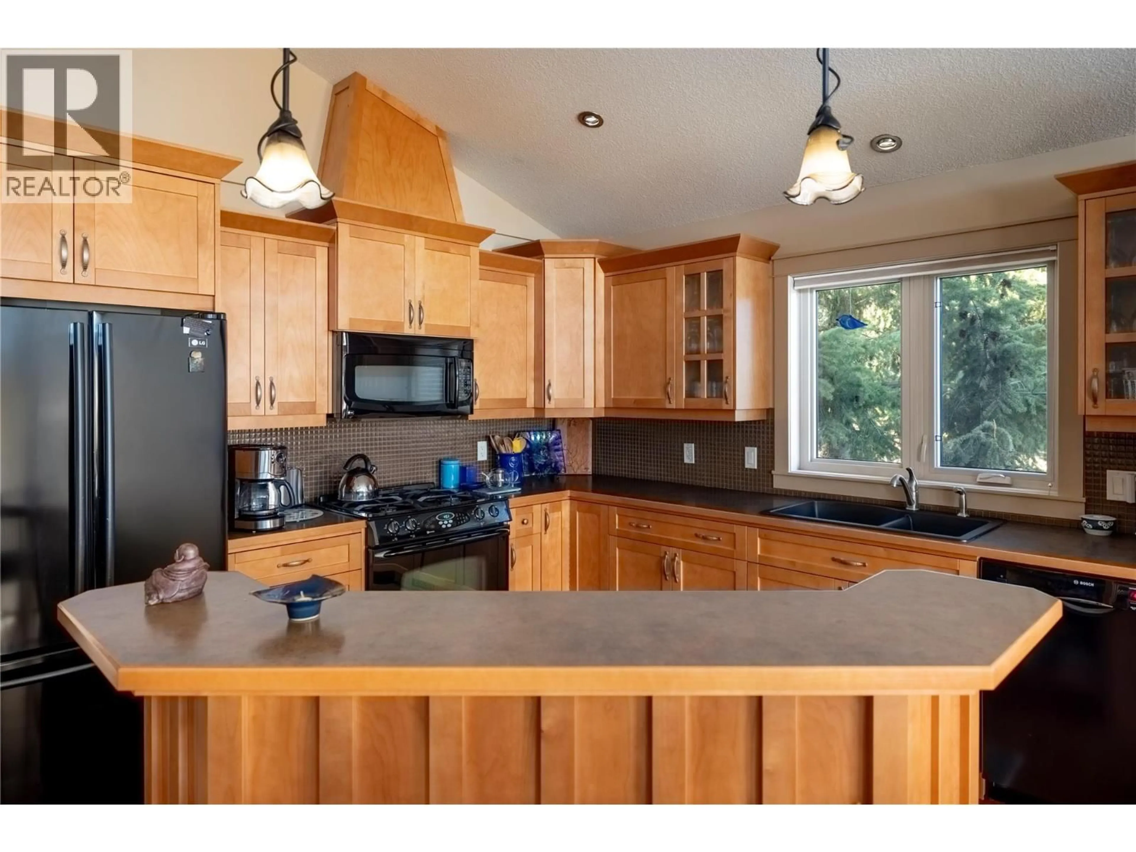 Open concept kitchen, unknown for 8215 SILVER STAR ROAD, Vernon British Columbia V1B3M8