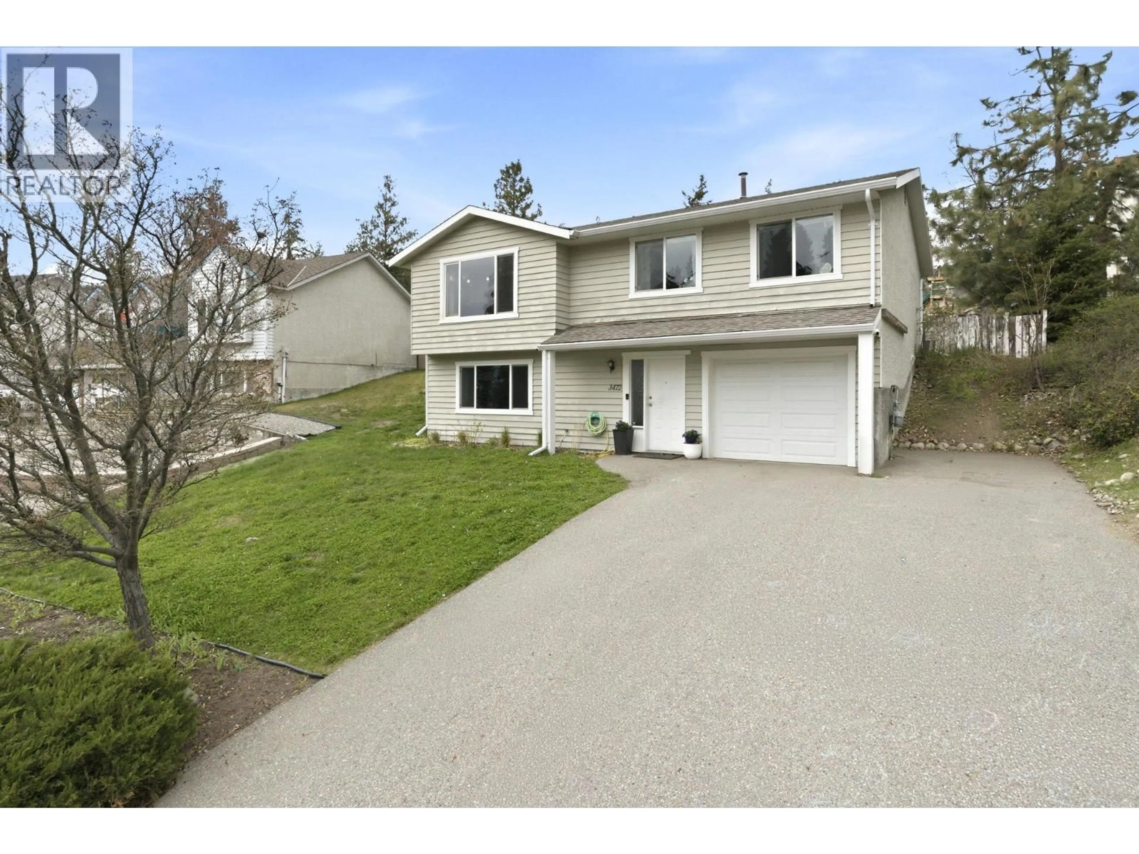 Home with vinyl exterior material, street for 3472 PARKLANE ROAD, West Kelowna British Columbia V4T1B8