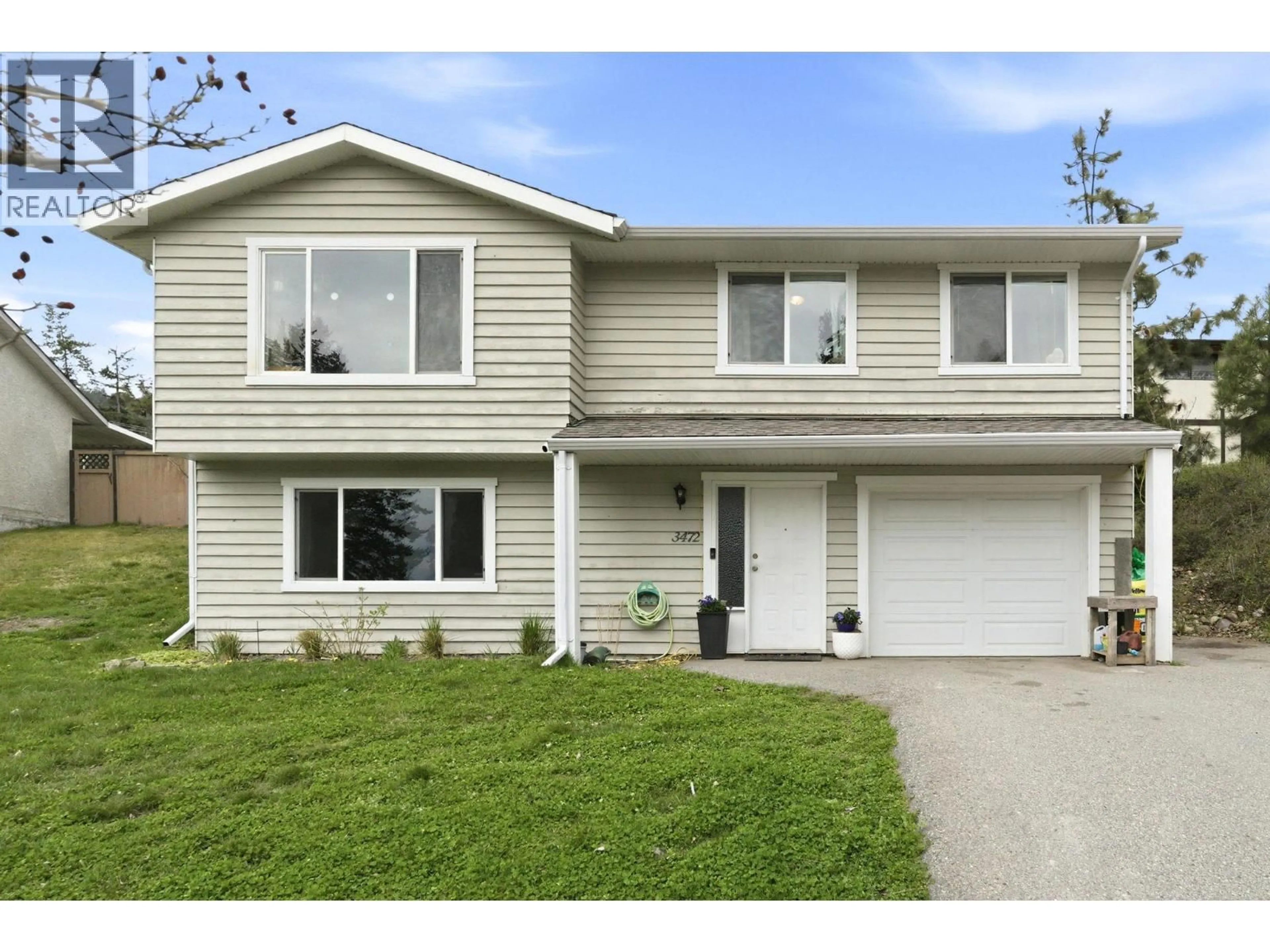 Home with vinyl exterior material, street for 3472 PARKLANE ROAD, West Kelowna British Columbia V4T1B8