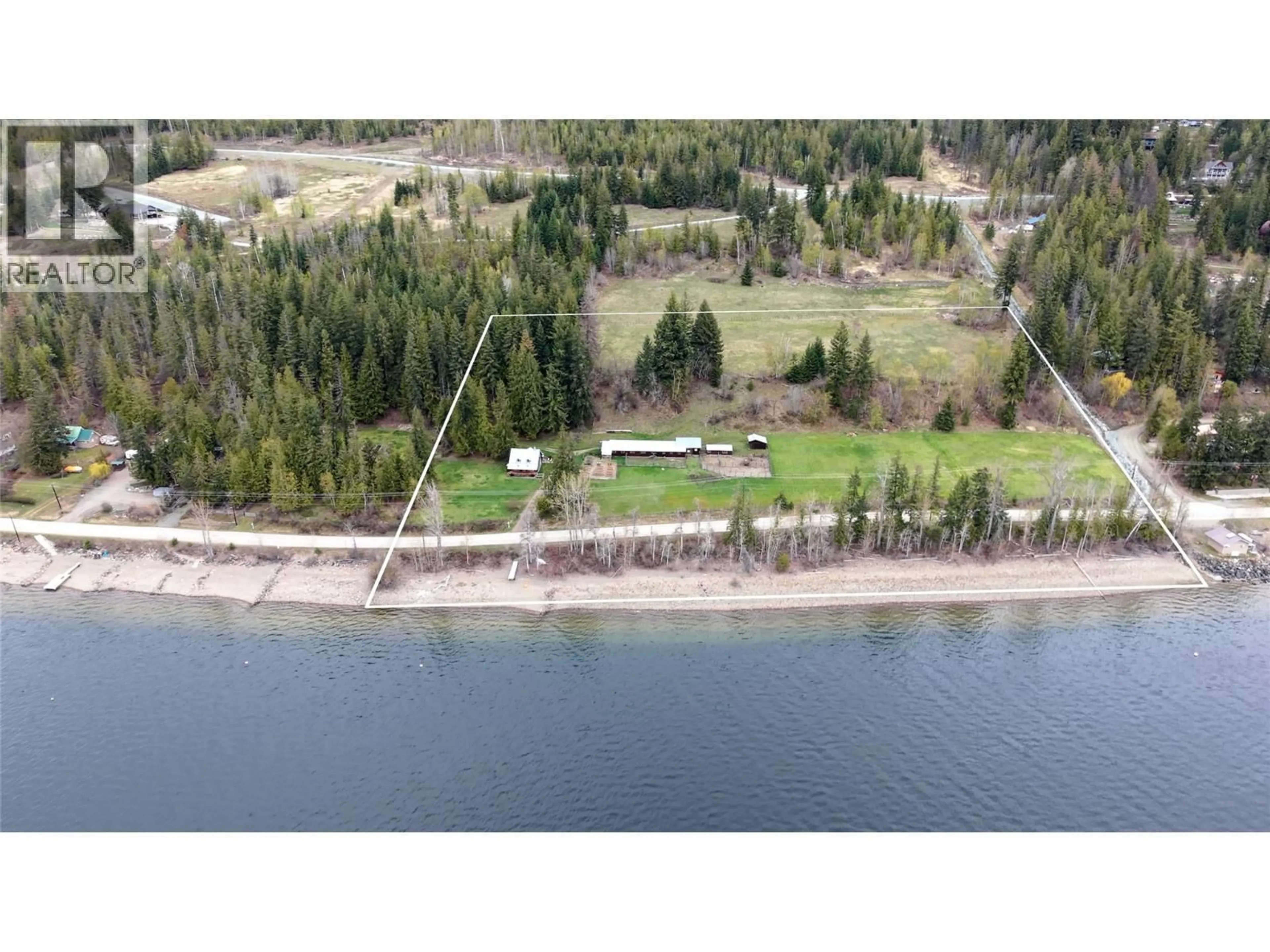 A pic from outside/outdoor area/front of a property/back of a property/a pic from drone, water/lake/river/ocean view for 7483 SQUILAX-ANGLEMONT ROAD, Anglemont British Columbia V0E1M8