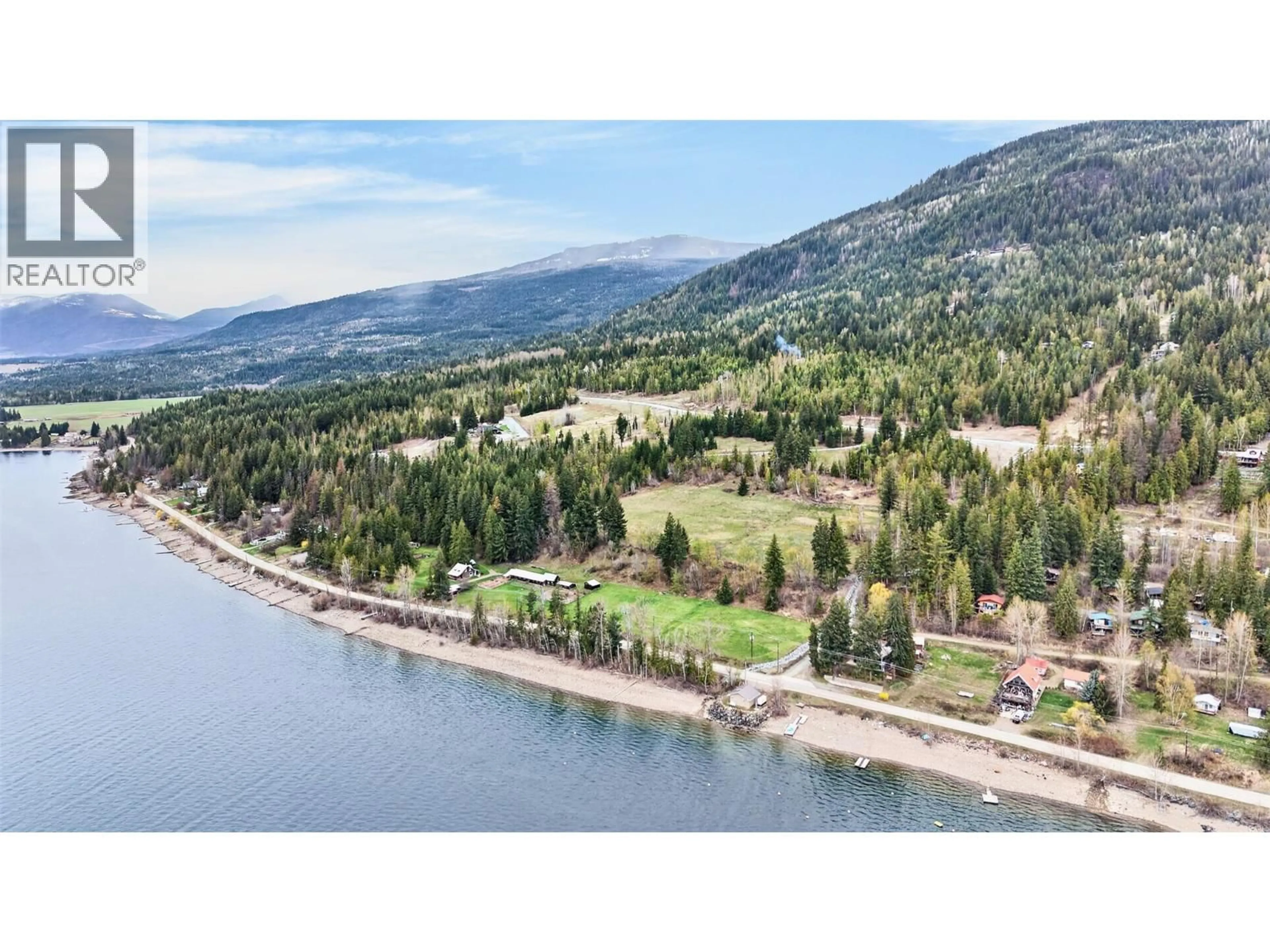 A pic from outside/outdoor area/front of a property/back of a property/a pic from drone, water/lake/river/ocean view for 7465 SQUILAX-ANGLEMONT ROAD, Anglemont British Columbia V0E1M8