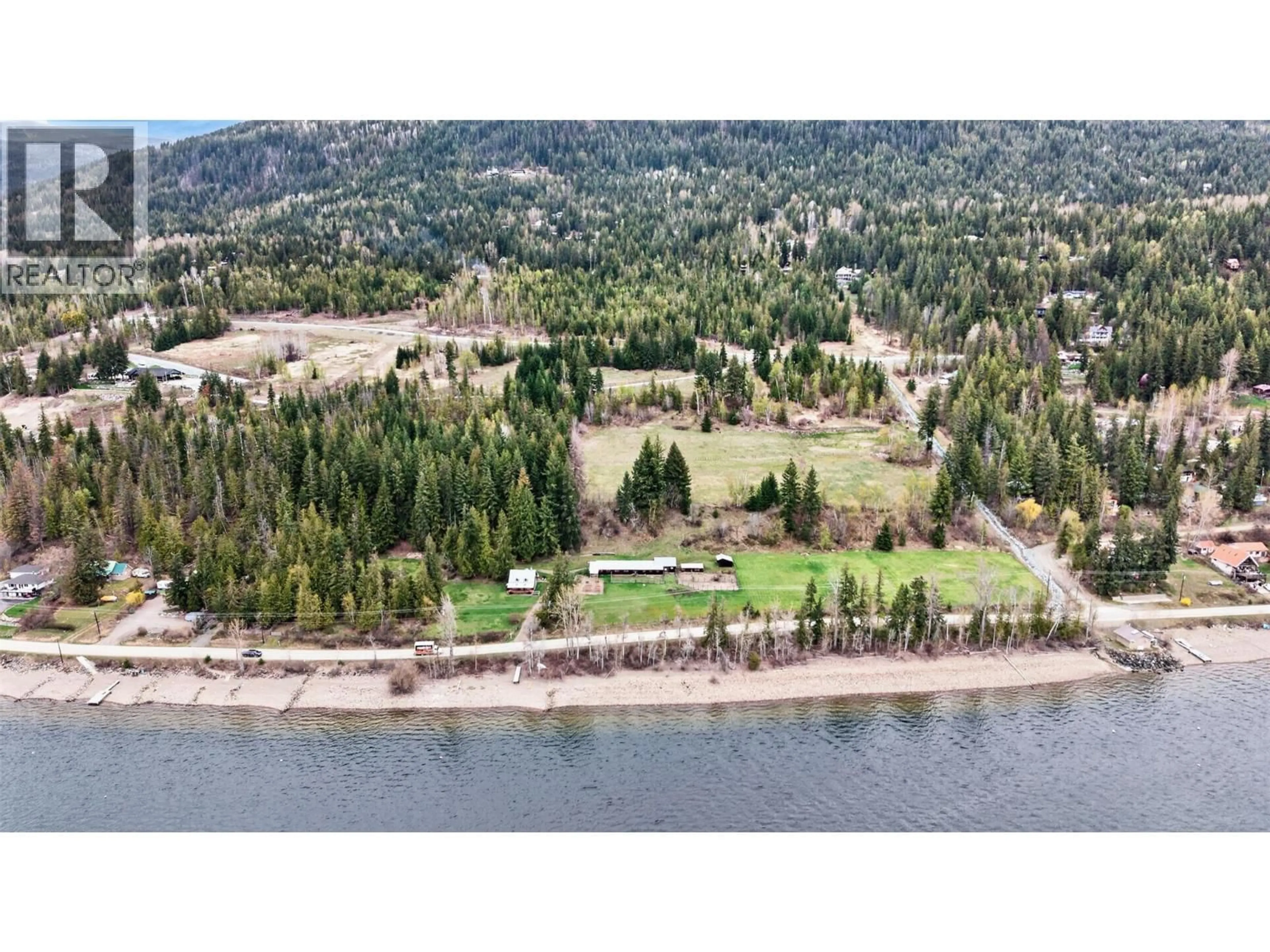 A pic from outside/outdoor area/front of a property/back of a property/a pic from drone, water/lake/river/ocean view for 7465 SQUILAX-ANGLEMONT ROAD, Anglemont British Columbia V0E1M8
