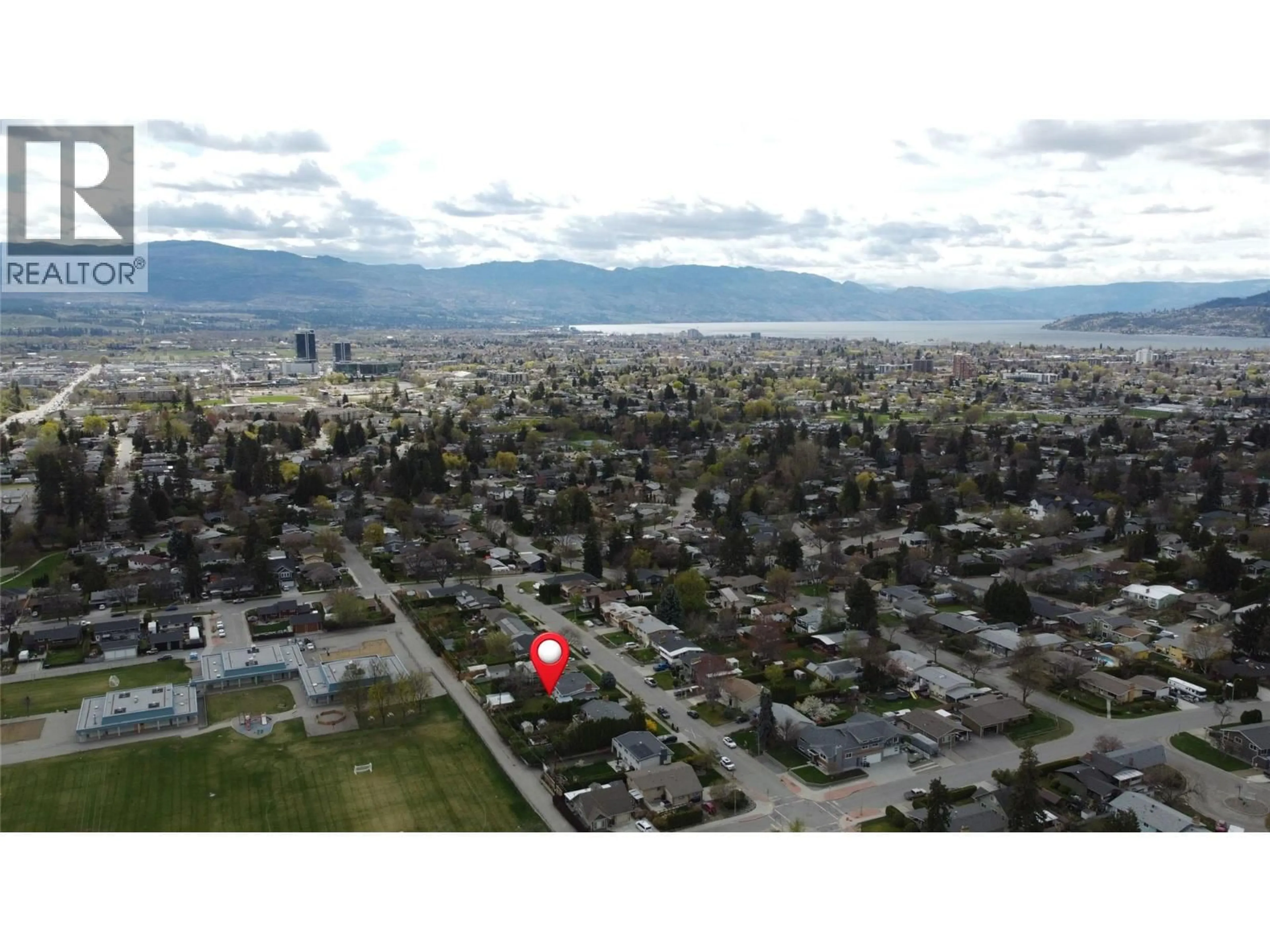 A pic from outside/outdoor area/front of a property/back of a property/a pic from drone, mountain view for 945 KENNEDY STREET, Kelowna British Columbia V1Y4E9