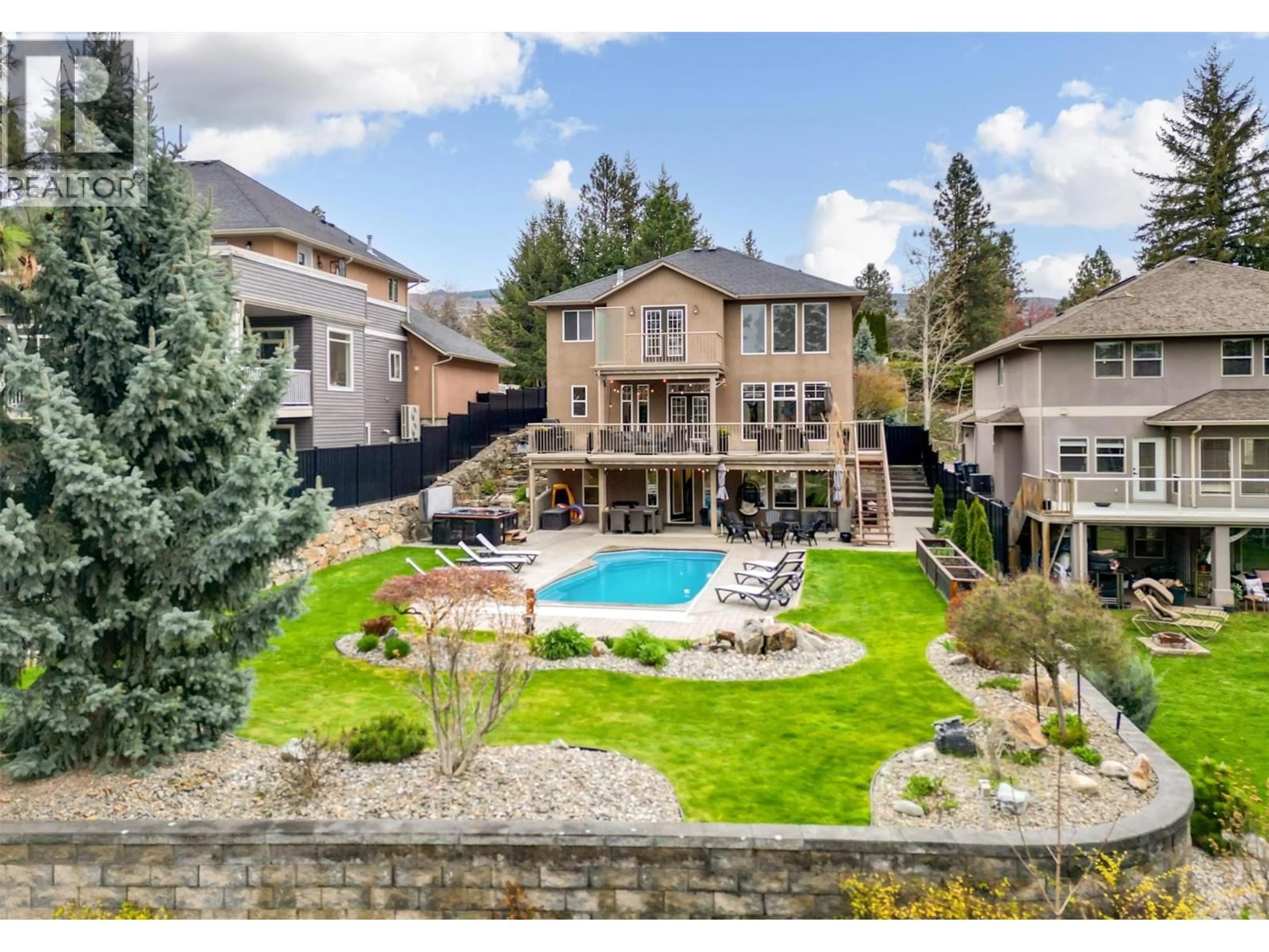 A pic from outside/outdoor area/front of a property/back of a property/a pic from drone, mountain view for 570 VINTAGE TERRACE ROAD, Kelowna British Columbia V1W3B3