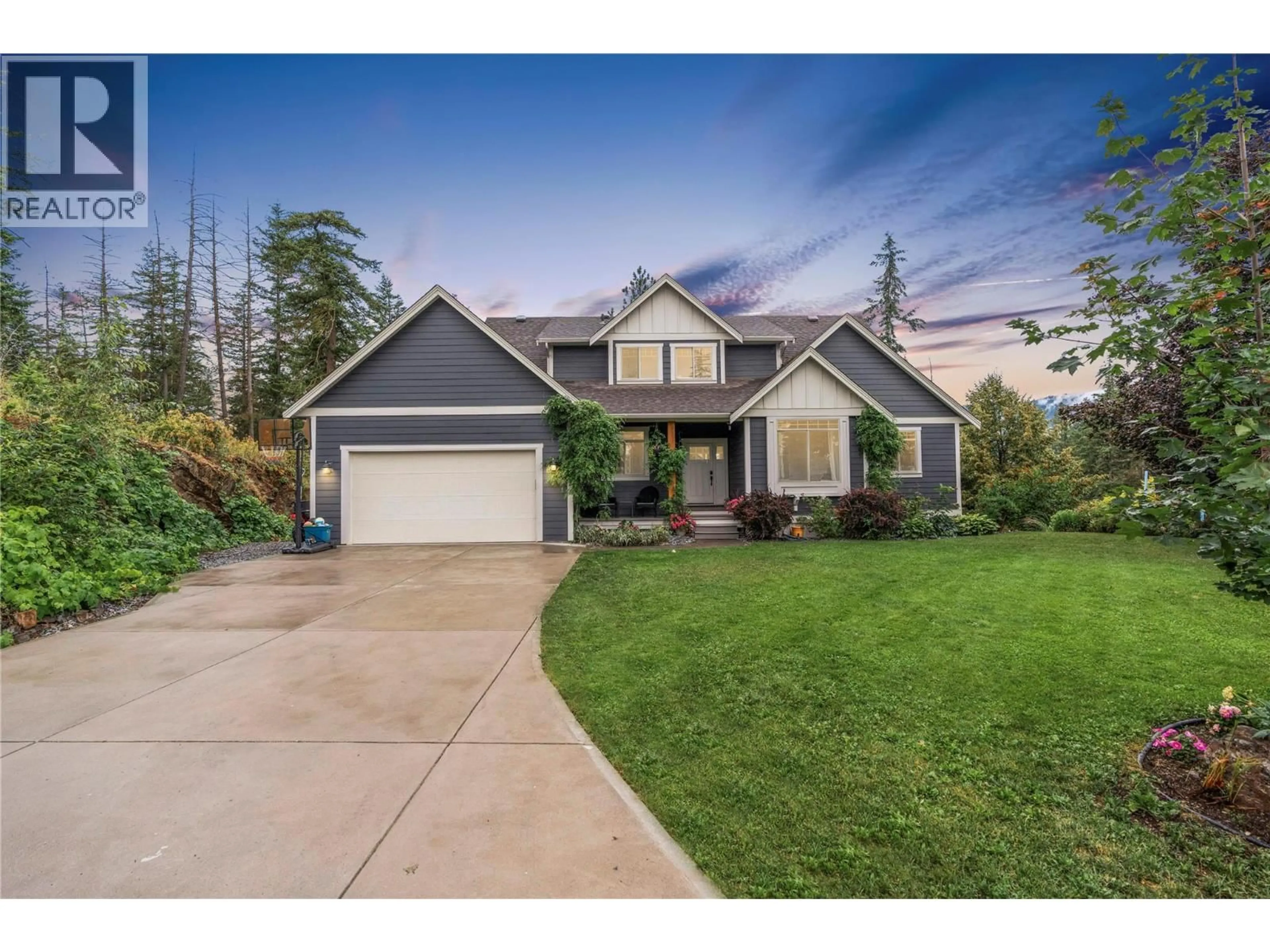 Home with vinyl exterior material, street for 4322 SHARP ROAD, Spallumcheen British Columbia V4Y0V6