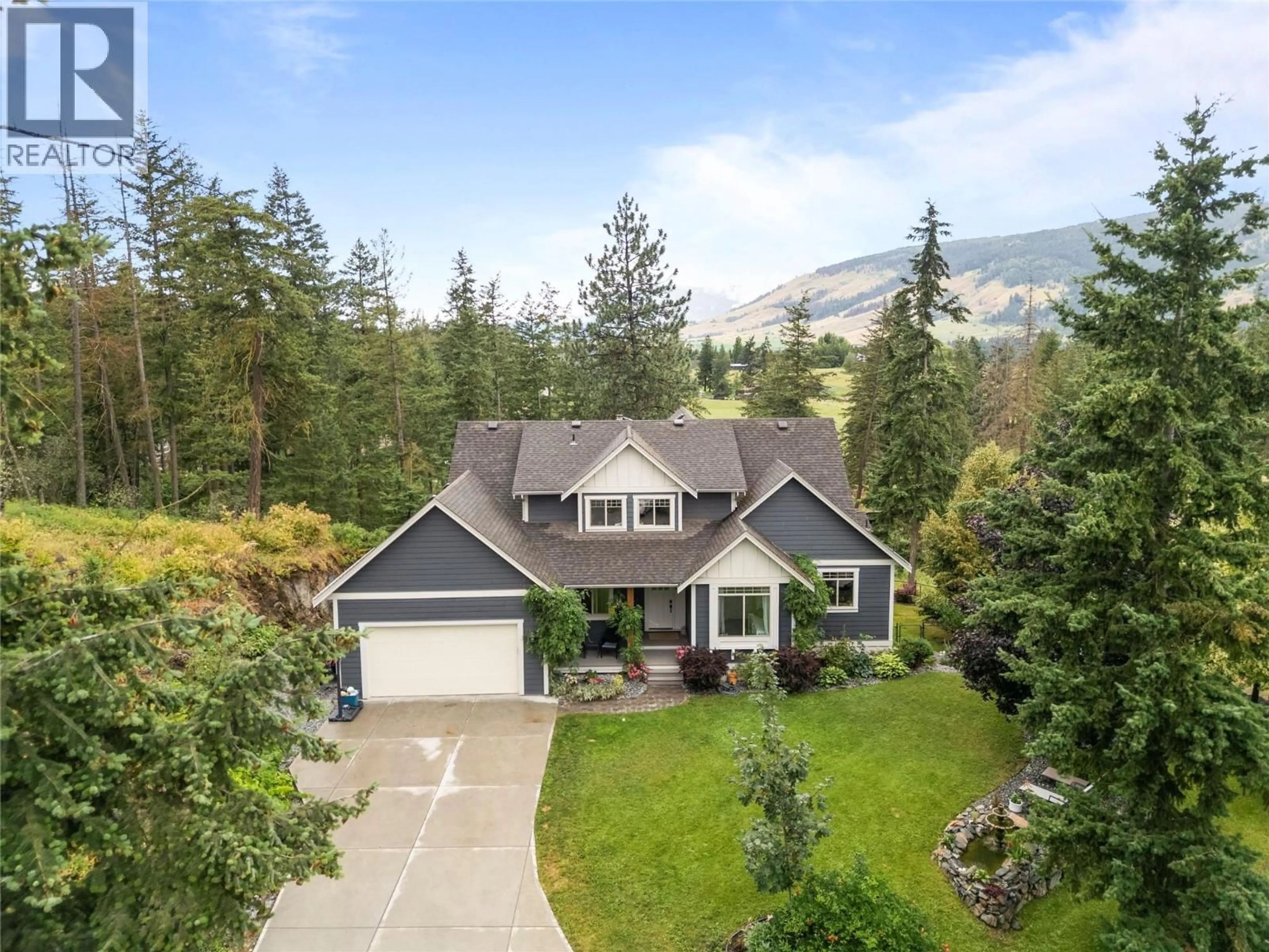 A pic from outside/outdoor area/front of a property/back of a property/a pic from drone, mountain view for 4322 SHARP ROAD, Spallumcheen British Columbia V4Y0V6