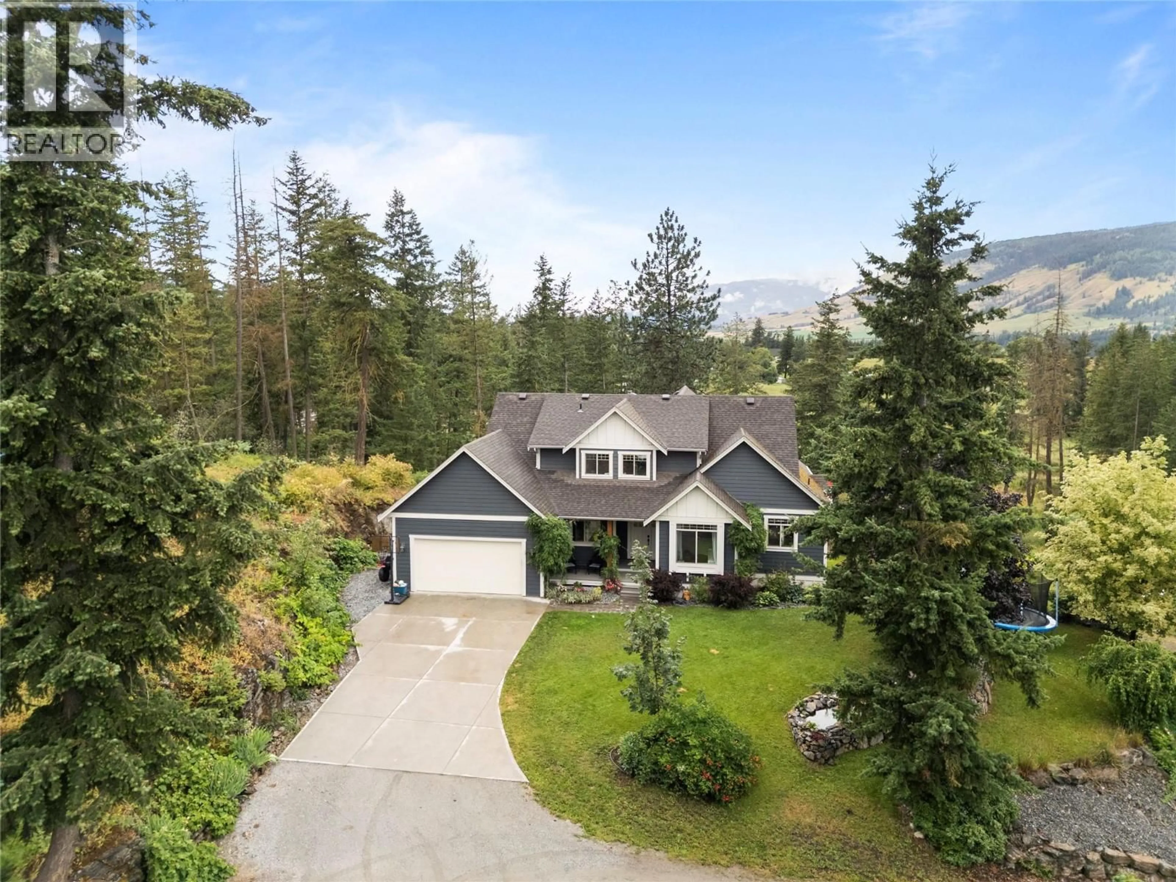 A pic from outside/outdoor area/front of a property/back of a property/a pic from drone, unknown for 4322 SHARP ROAD, Spallumcheen British Columbia V4Y0V6