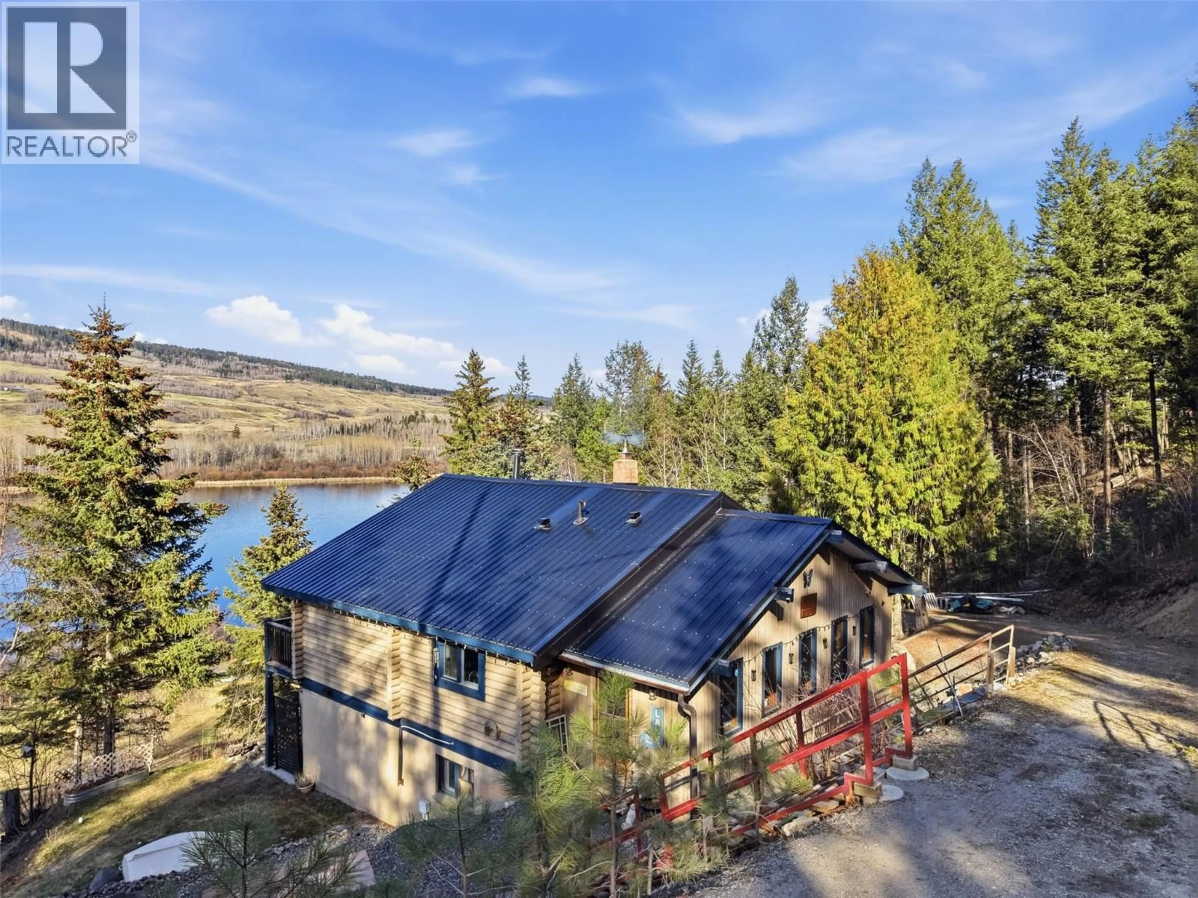 A pic from outside/outdoor area/front of a property/back of a property/a pic from drone, water/lake/river/ocean view for 3267 POWELL ROAD, Kamloops British Columbia V0E3E1