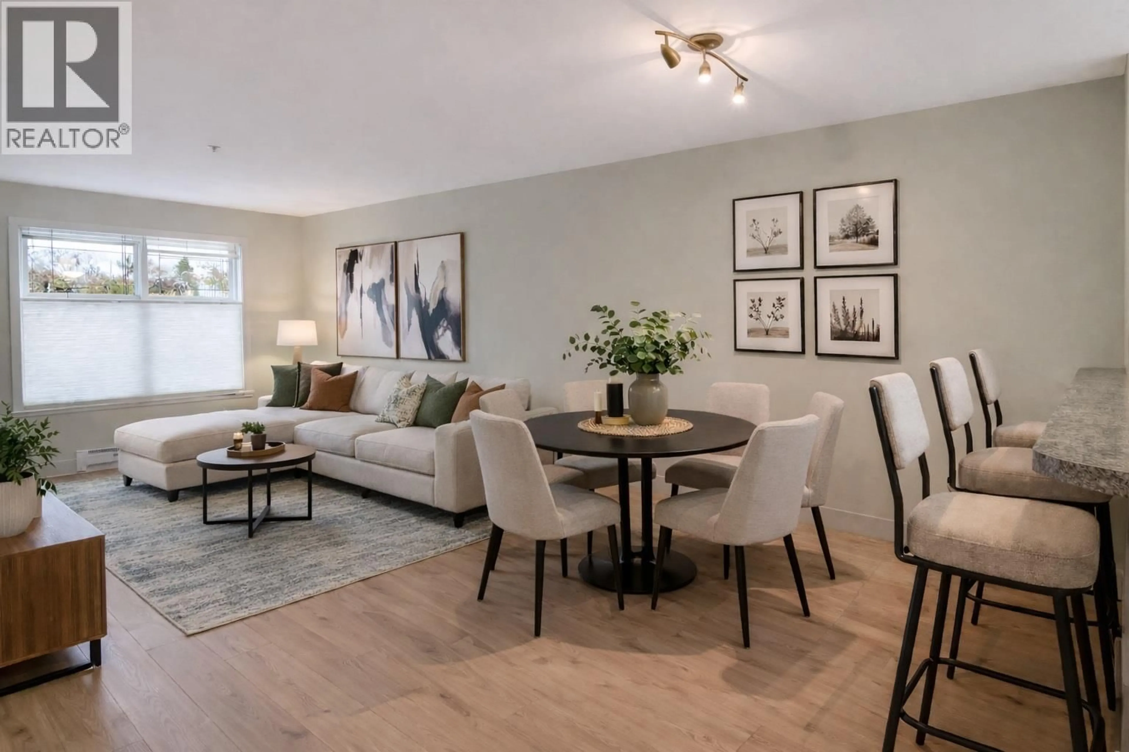 Living room with furniture, wood/laminate floor for 109 - 515 HOUGHTON ROAD, Kelowna British Columbia V1X7P9