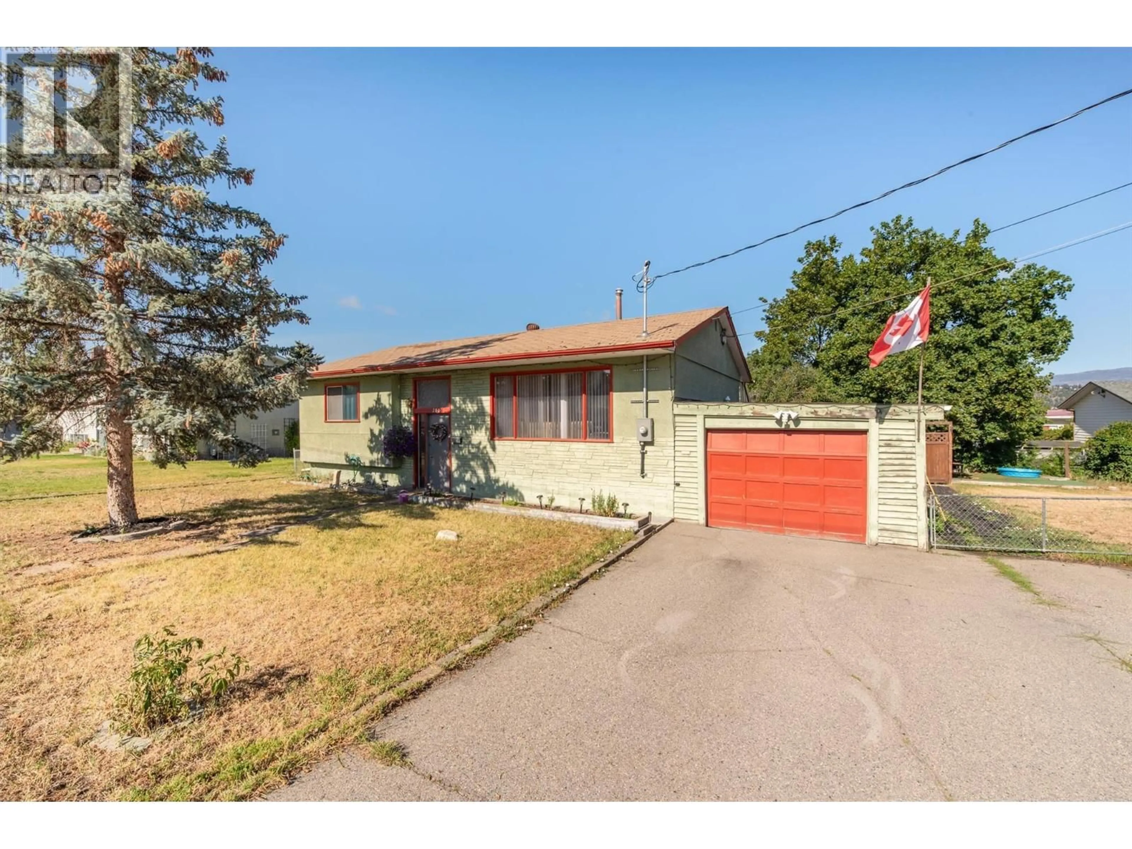A pic from outside/outdoor area/front of a property/back of a property/a pic from drone, street for 280 DOUGALL ROAD SOUTH, Kelowna British Columbia V1X3J6