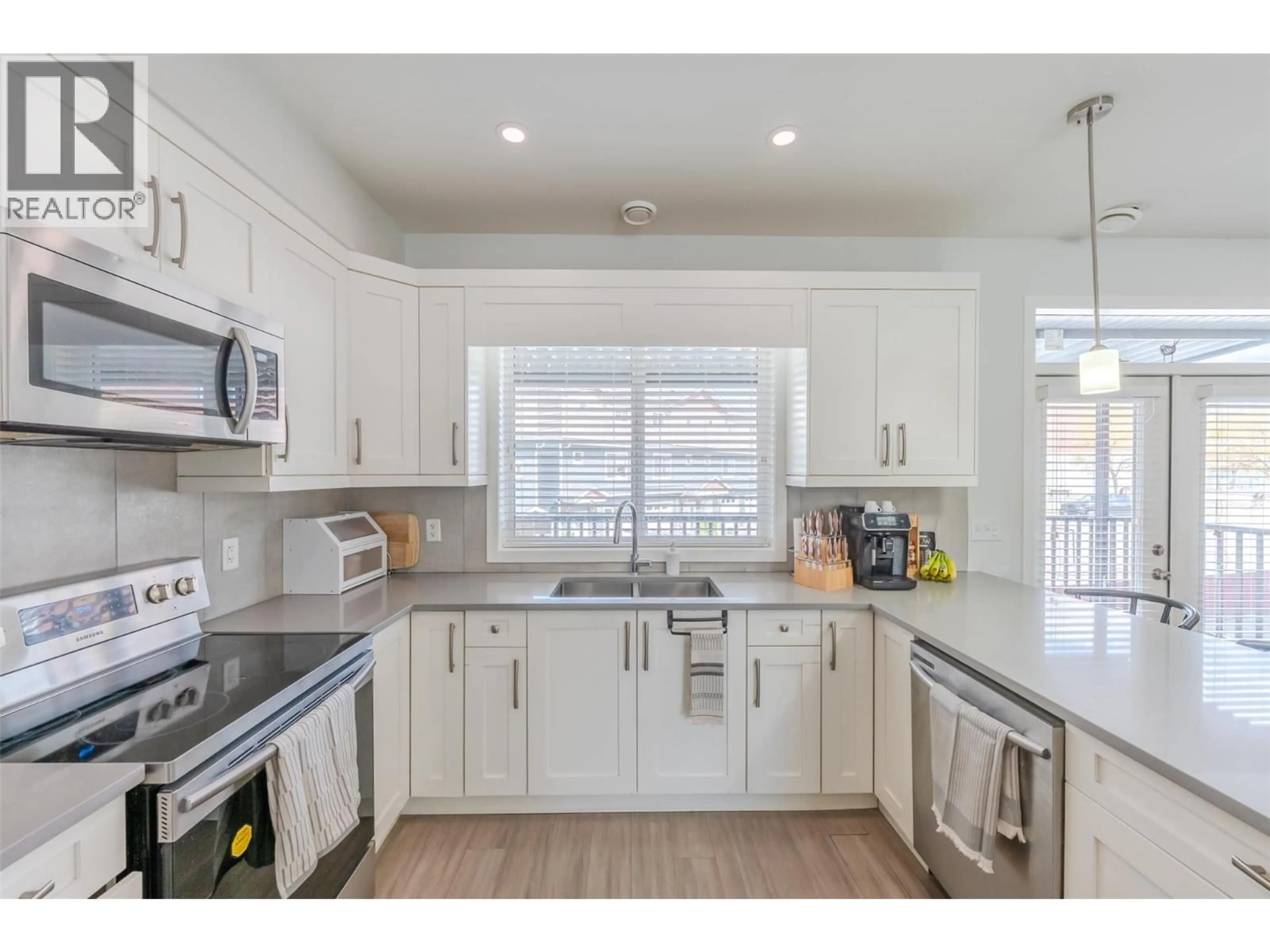 Open concept kitchen, ceramic/tile floor for 107 - 203 EDMONTON AVENUE, Penticton British Columbia V2A2G4