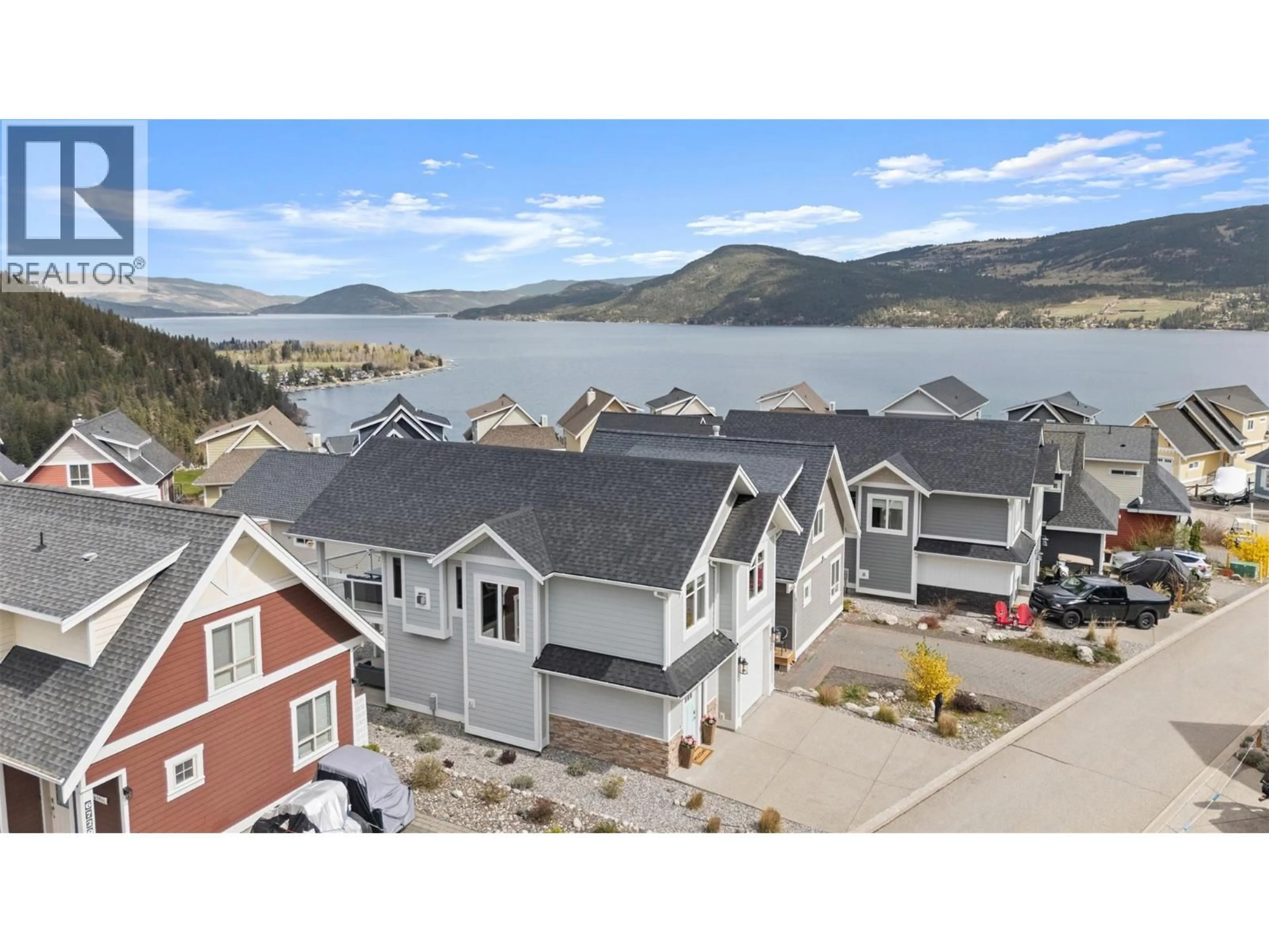 A pic from outside/outdoor area/front of a property/back of a property/a pic from drone, water/lake/river/ocean view for 371 - 6727 MARBELLA LOOP, Kelowna British Columbia V1Z3R8