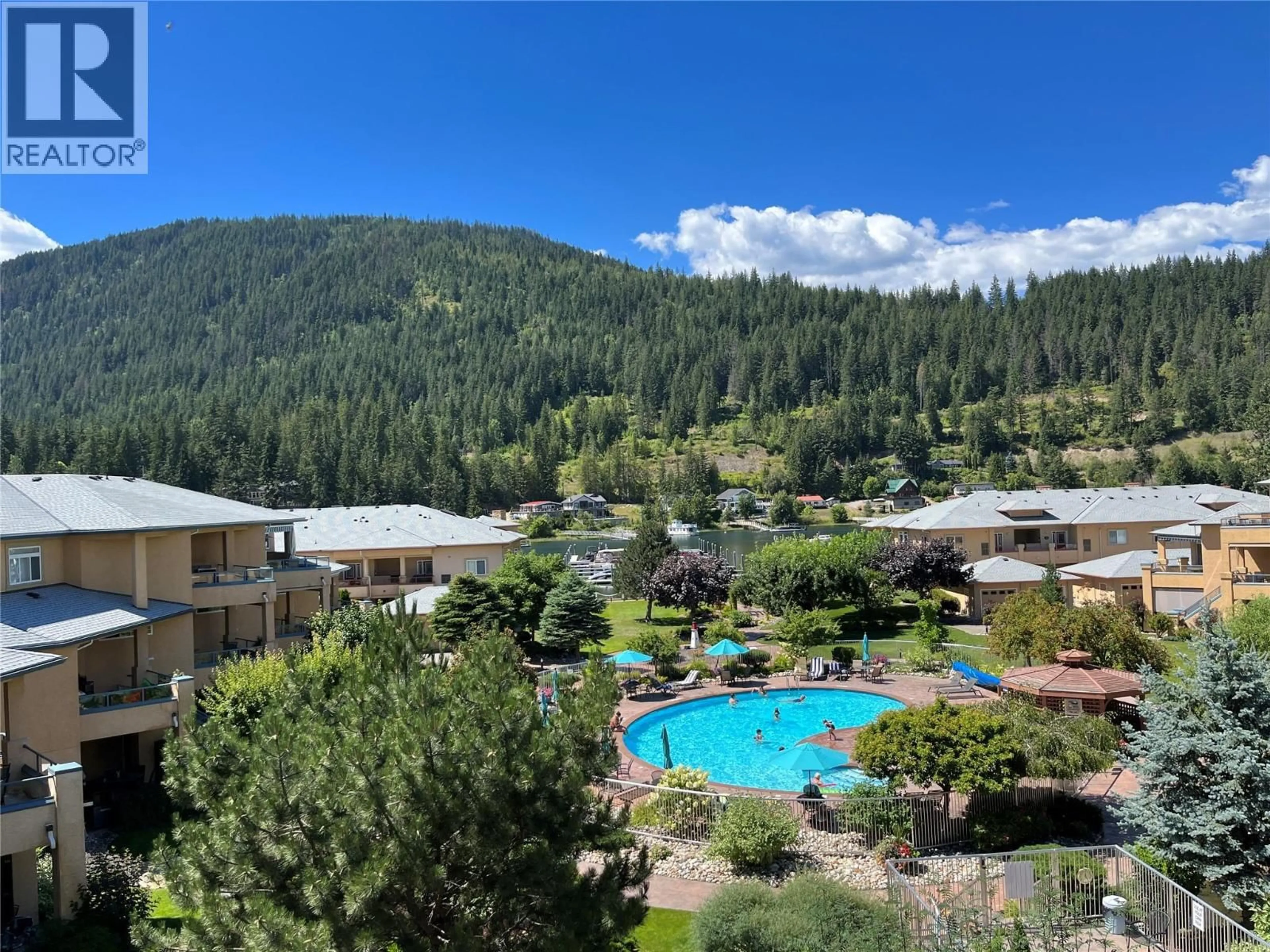 A pic from outside/outdoor area/front of a property/back of a property/a pic from drone, mountain view for 32 - 714 RIVERSIDE AVENUE, Sicamous British Columbia V0E2V1