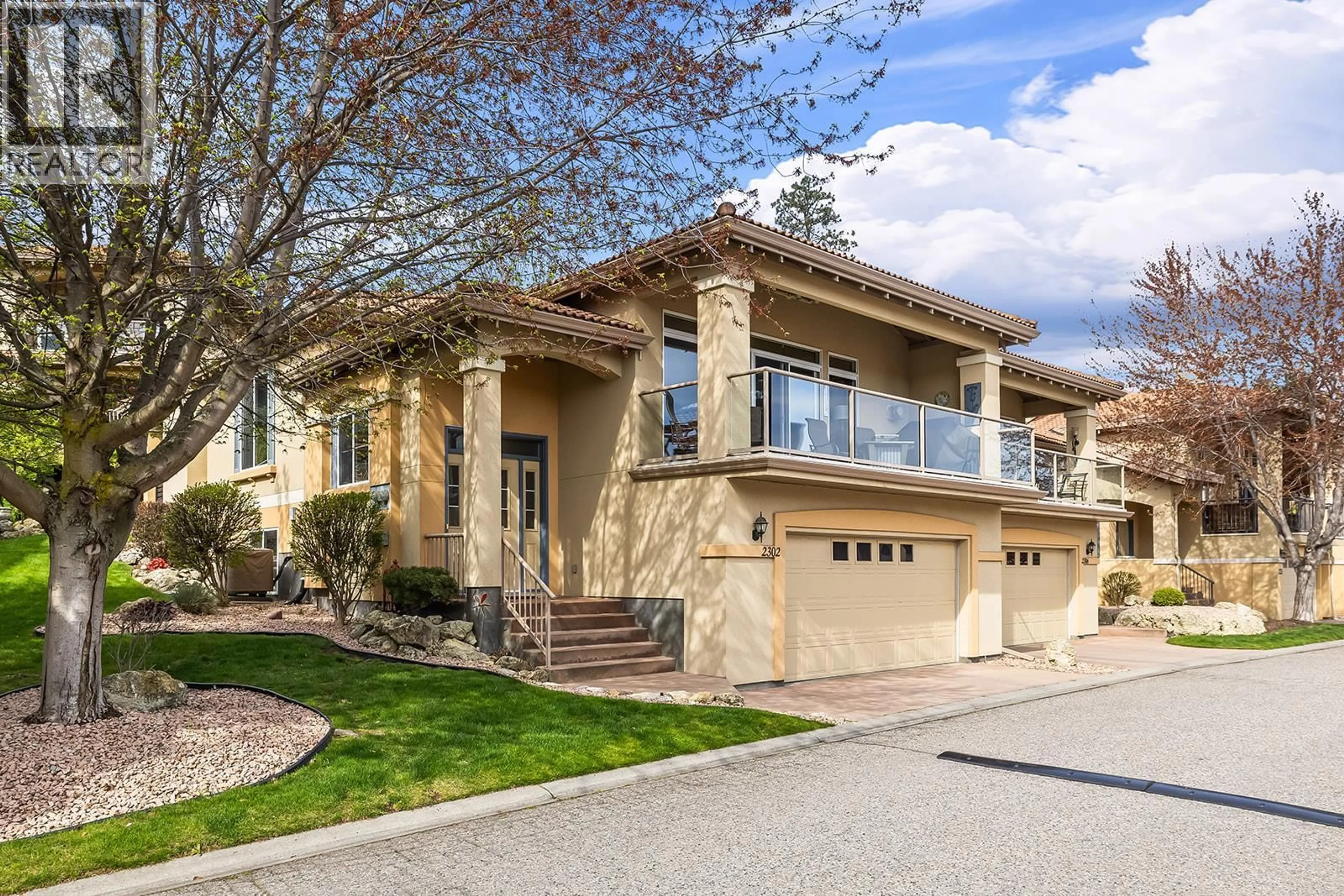Home with vinyl exterior material, street for 2302 COUNTRY CLUB DRIVE, Kelowna British Columbia V1V2M6