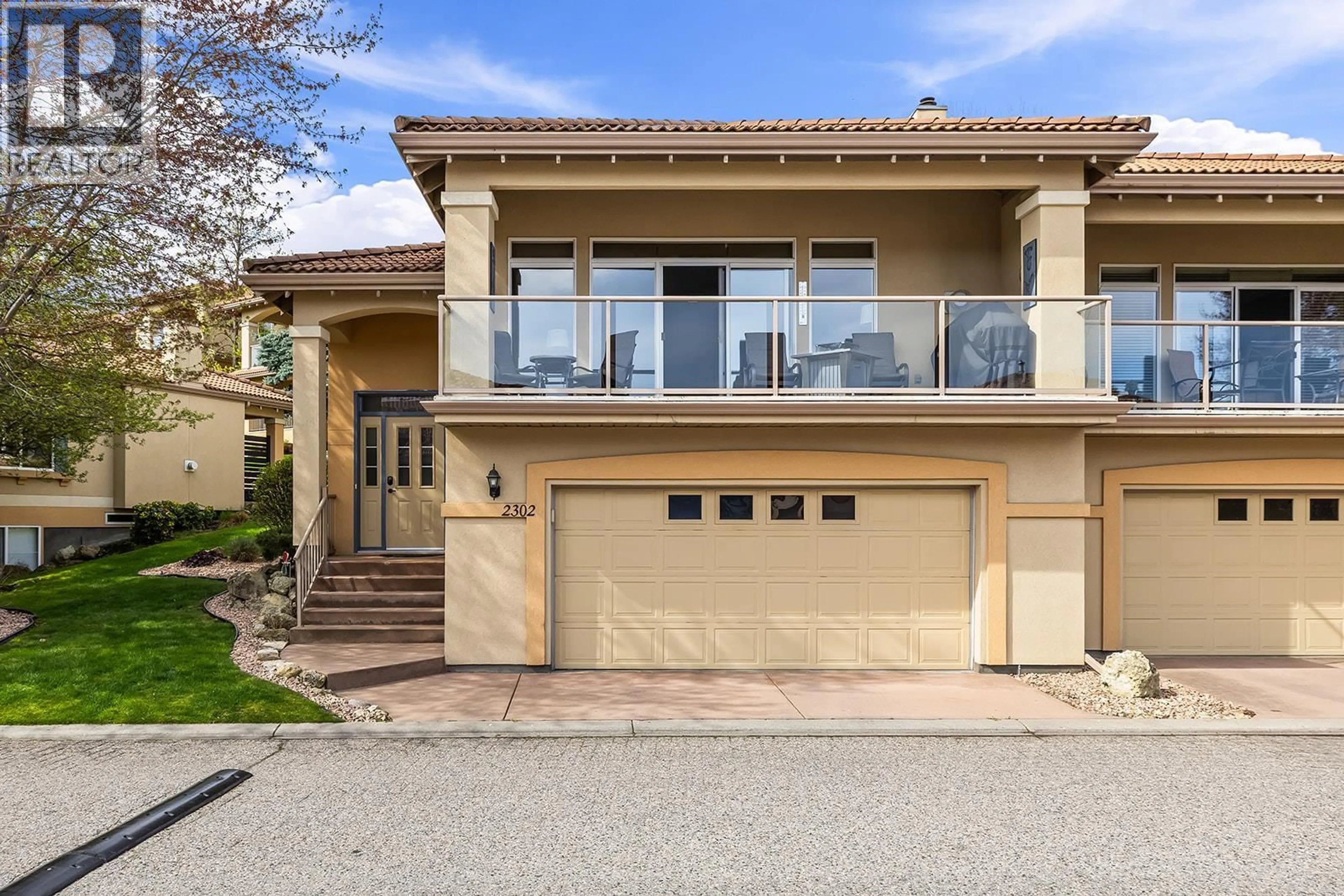 Home with vinyl exterior material, street for 2302 COUNTRY CLUB DRIVE, Kelowna British Columbia V1V2M6