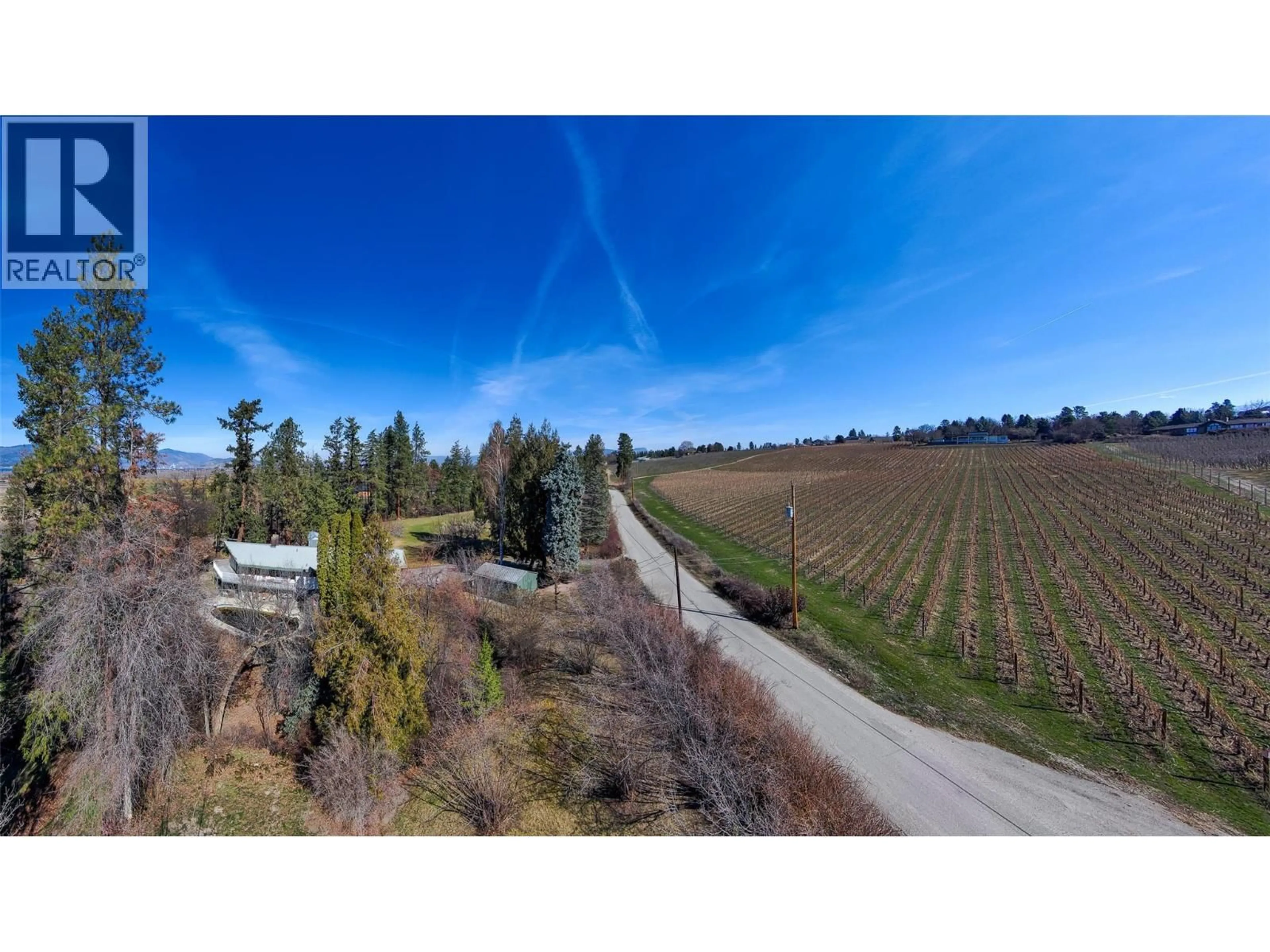A pic from outside/outdoor area/front of a property/back of a property/a pic from drone, unknown for 4150 HUGHES ROAD, Kelowna British Columbia V1W4S3