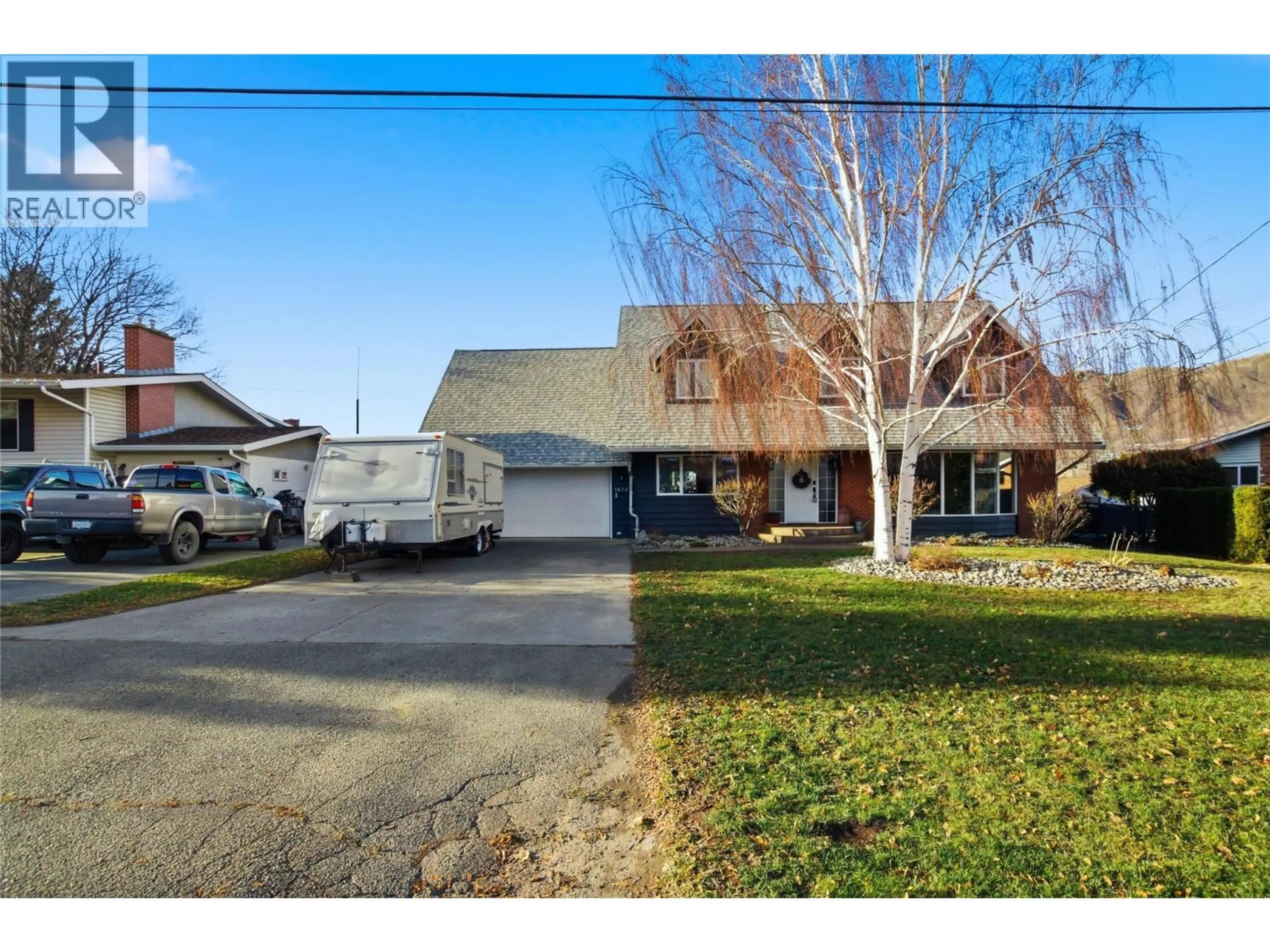 A pic from outside/outdoor area/front of a property/back of a property/a pic from drone, street for 1834 RUSSET WYND, Kamloops British Columbia V2C4N5