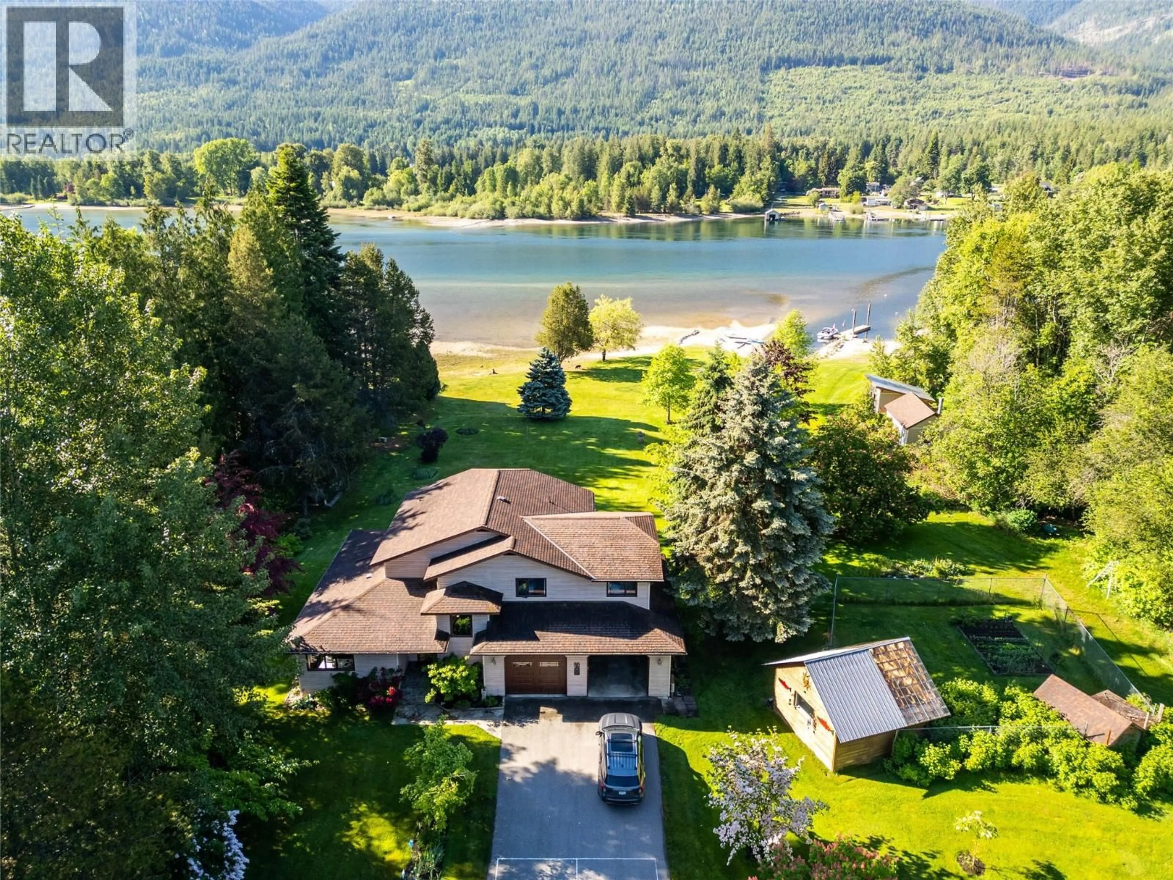 A pic from outside/outdoor area/front of a property/back of a property/a pic from drone, water/lake/river/ocean view for 6158 REDFISH ROAD, Nelson British Columbia V1L6M9