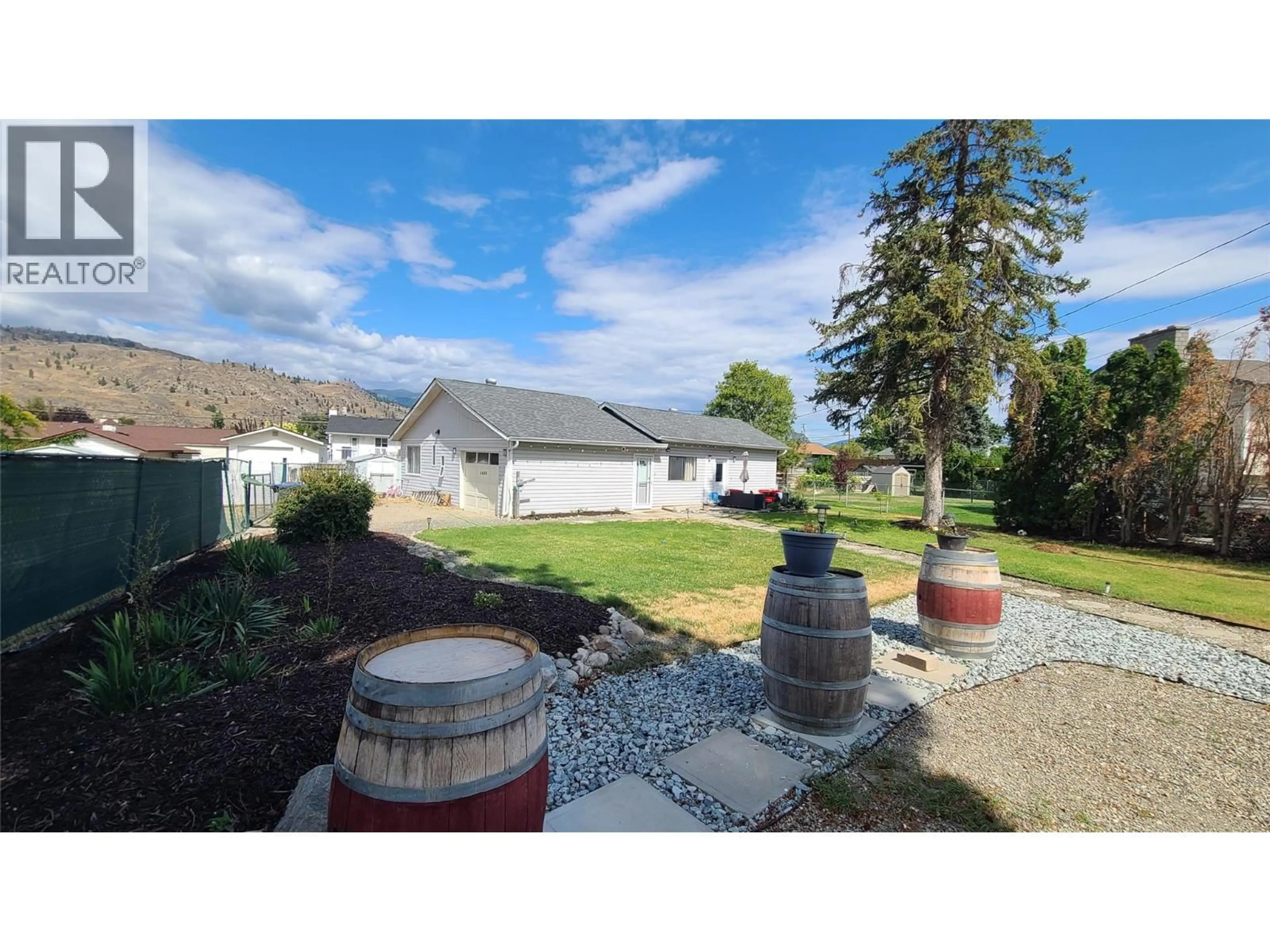 A pic from outside/outdoor area/front of a property/back of a property/a pic from drone, street for 6488 WOLFCUB PLACE PLACE, Oliver British Columbia V0H1T3