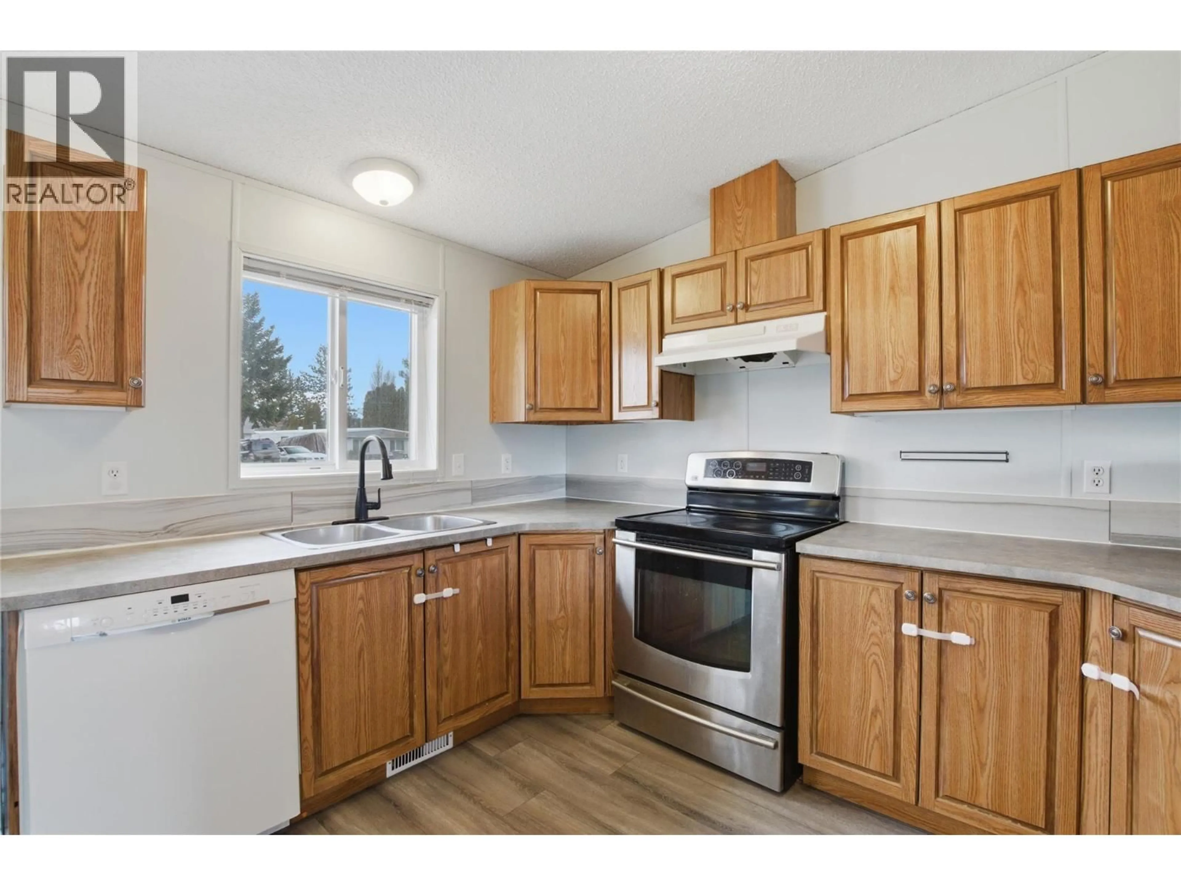 Standard kitchen, wood/laminate floor for 779 KLAHANIE DRIVE, Kamloops British Columbia V2C5R1