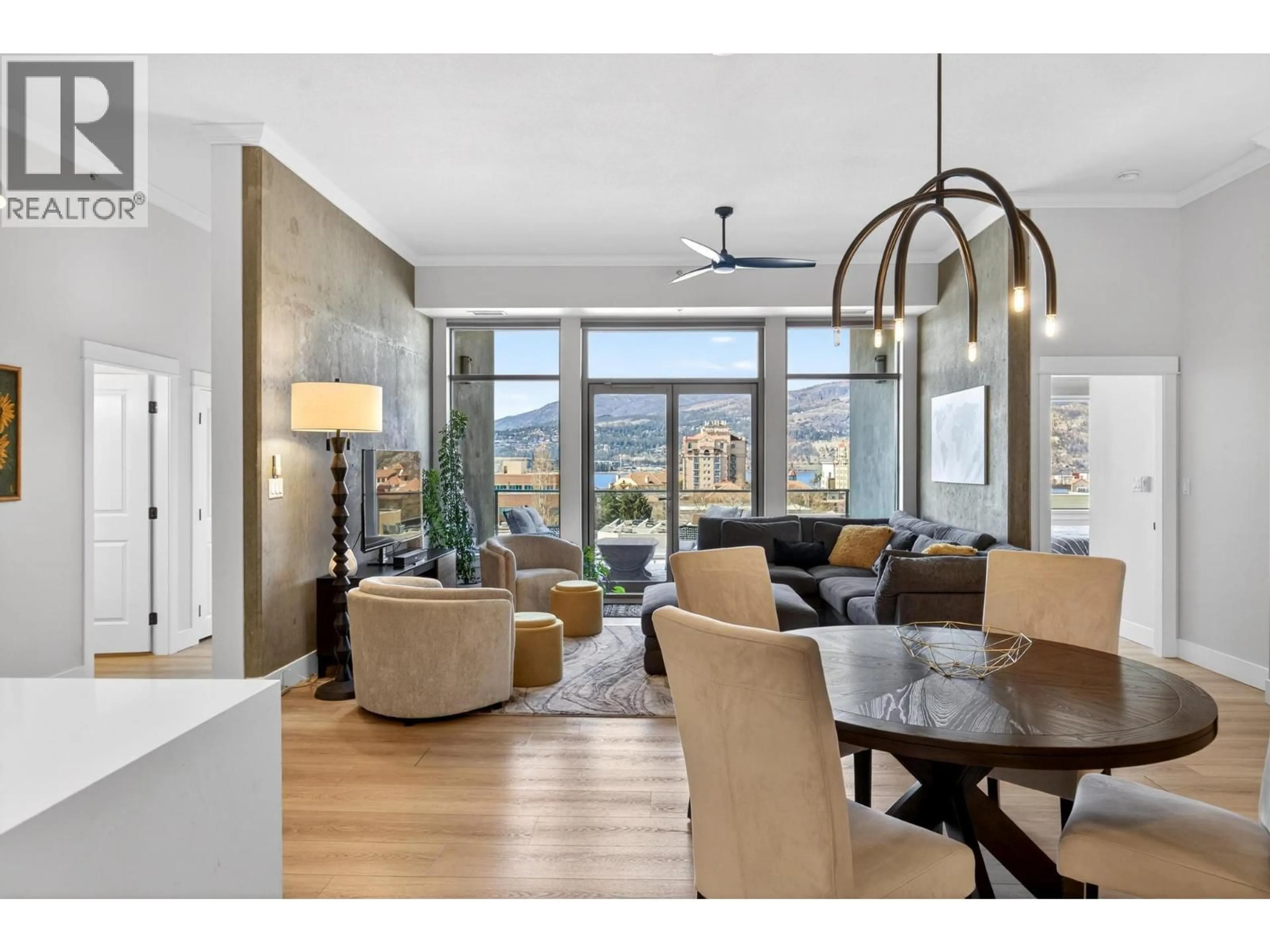 Living room with furniture, wood/laminate floor for 502 - 1329 ELLIS STREET, Kelowna British Columbia V1Y9X5