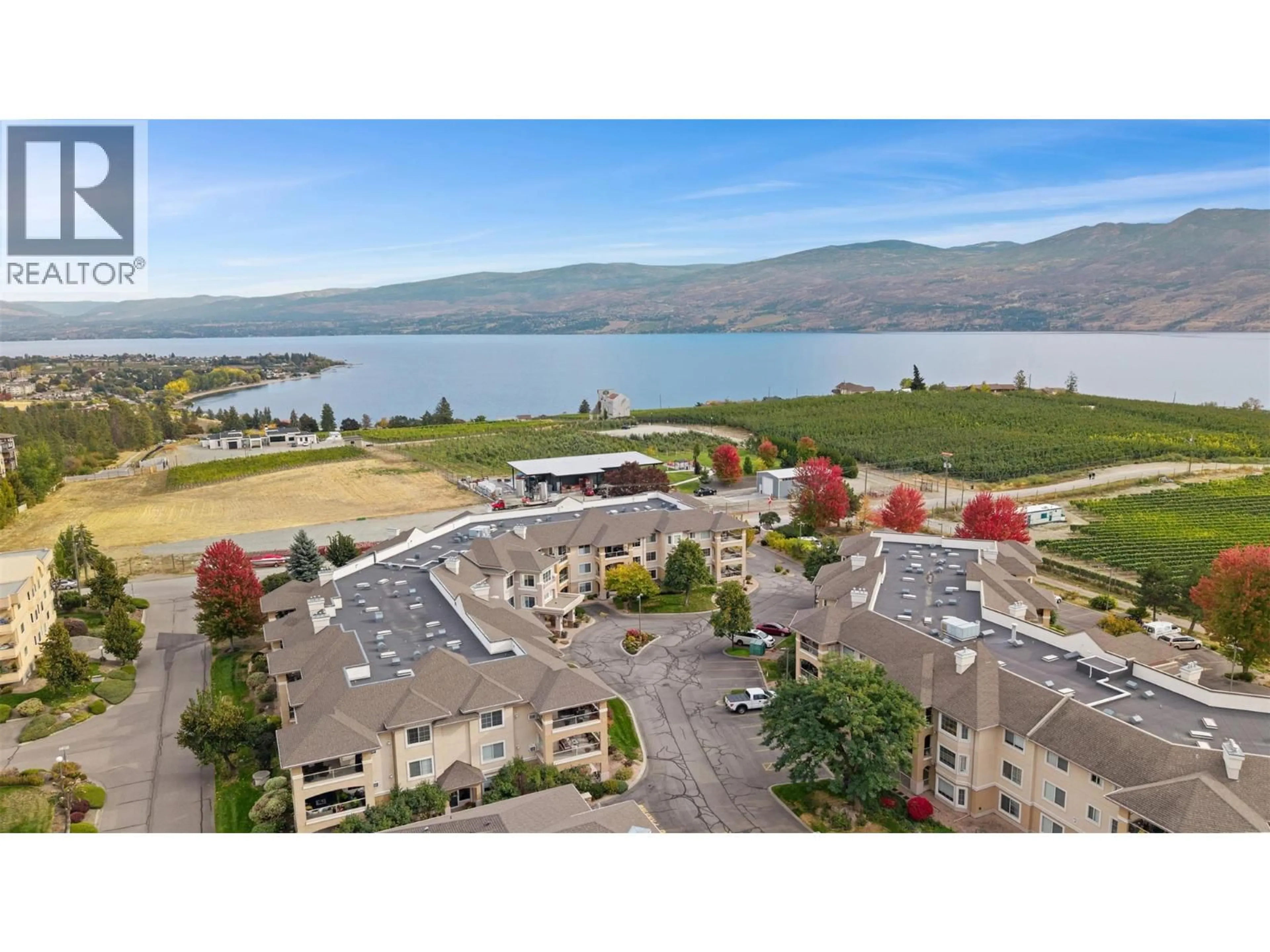 A pic from outside/outdoor area/front of a property/back of a property/a pic from drone, water/lake/river/ocean view for 305 - 3870 BROWN ROAD, West Kelowna British Columbia V4T2J5
