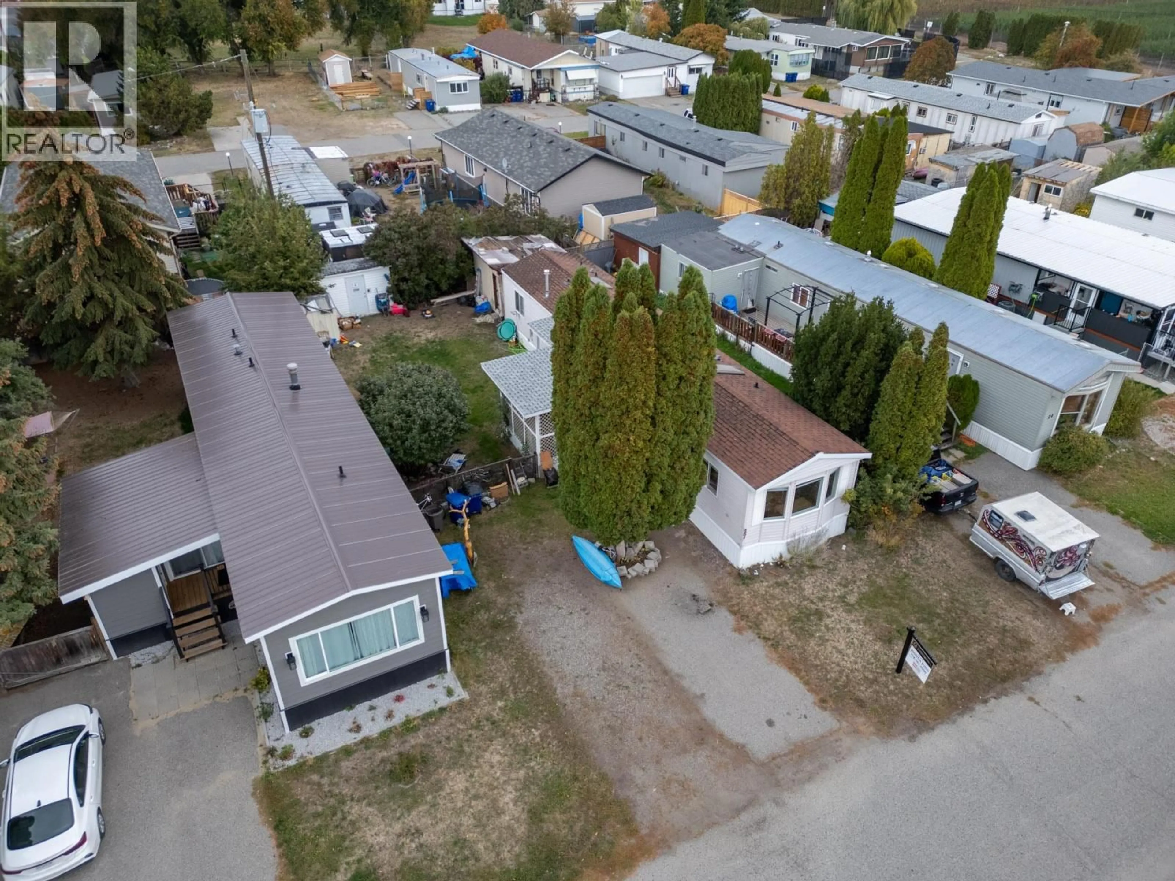 A pic from outside/outdoor area/front of a property/back of a property/a pic from drone, street for 27 - 2005 BOUCHERIE ROAD, Westbank British Columbia V4T1R4