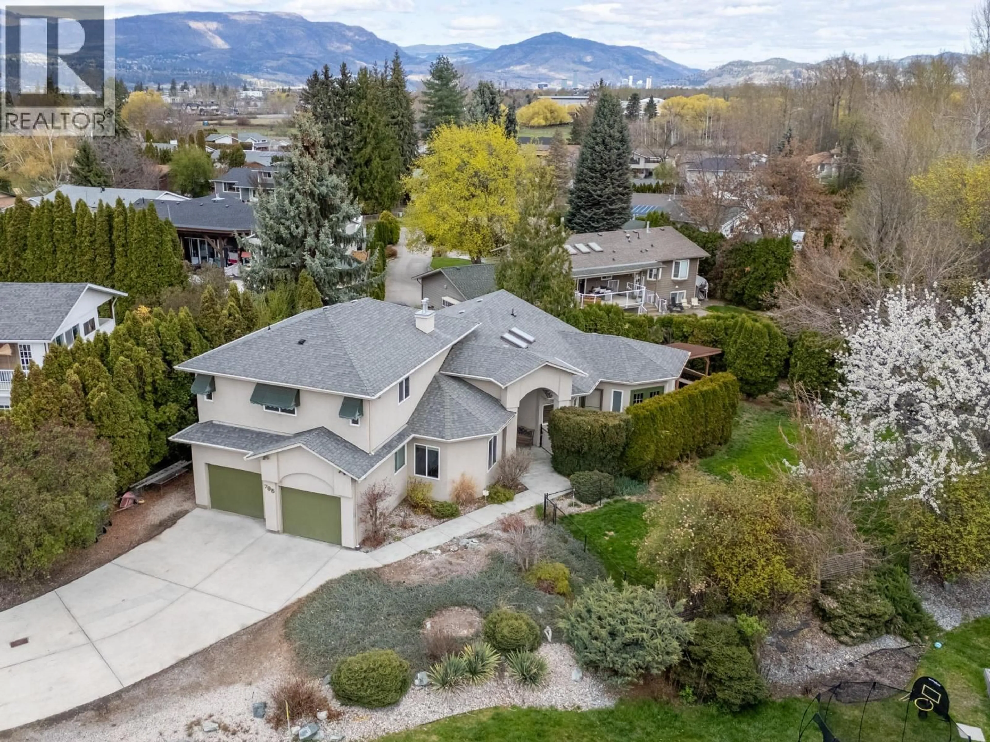 A pic from outside/outdoor area/front of a property/back of a property/a pic from drone, mountain view for 795 TORRS COURT, Kelowna British Columbia V1W1B5