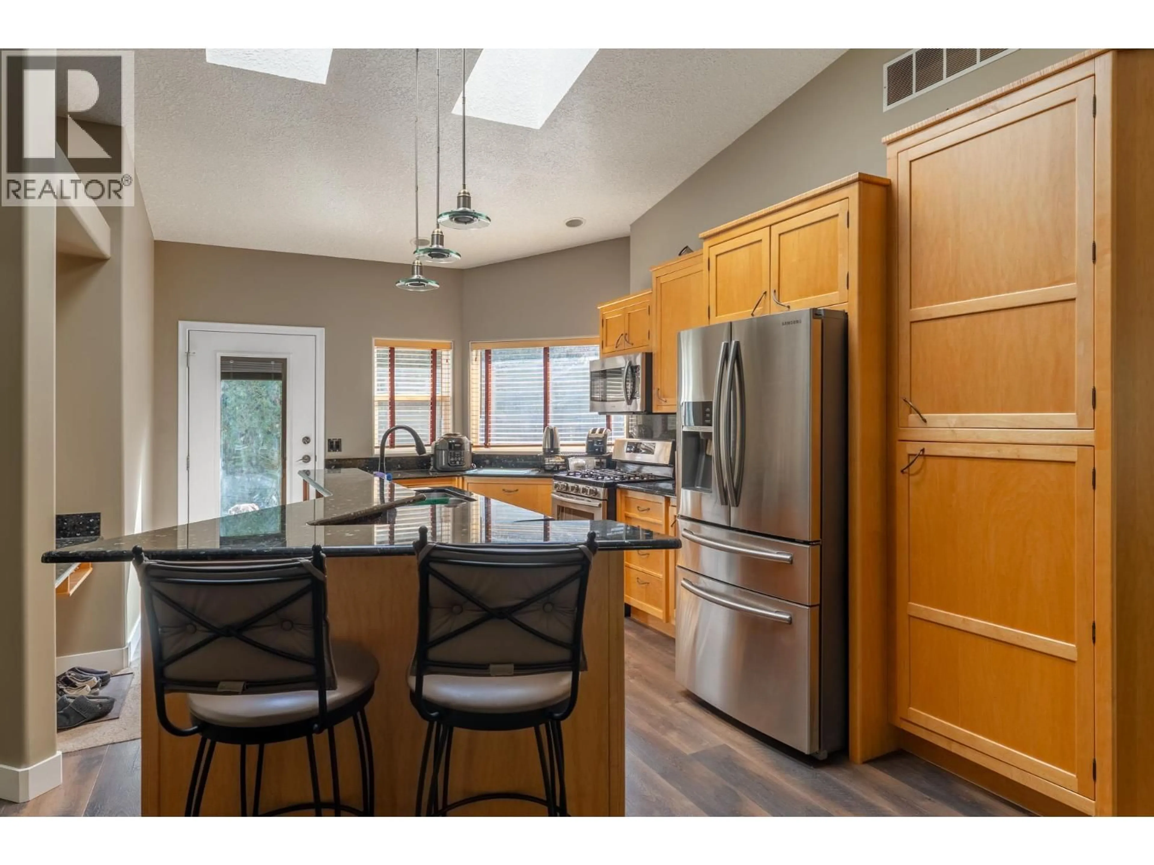 Open concept kitchen, unknown for 795 TORRS COURT, Kelowna British Columbia V1W1B5