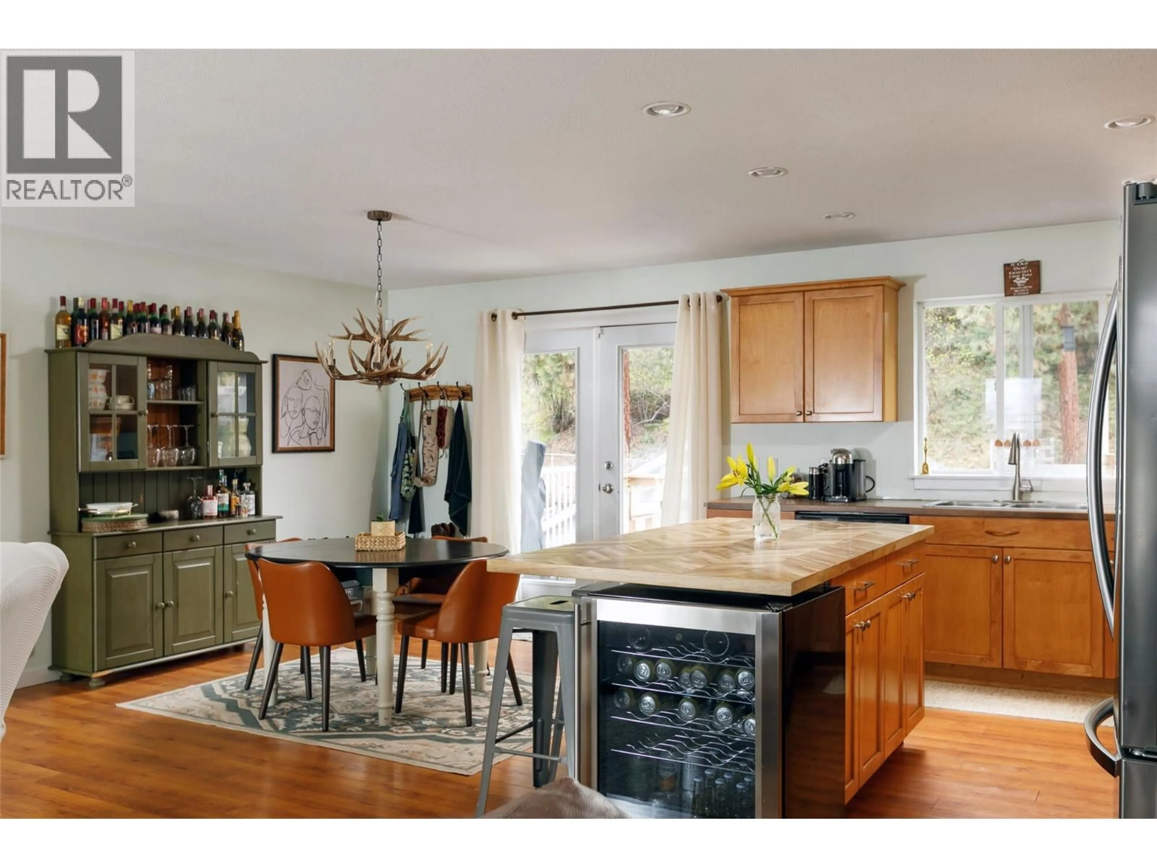 Open concept kitchen, unknown for 7318 FINTRY DELTA ROAD, Kelowna British Columbia V1Z3V2