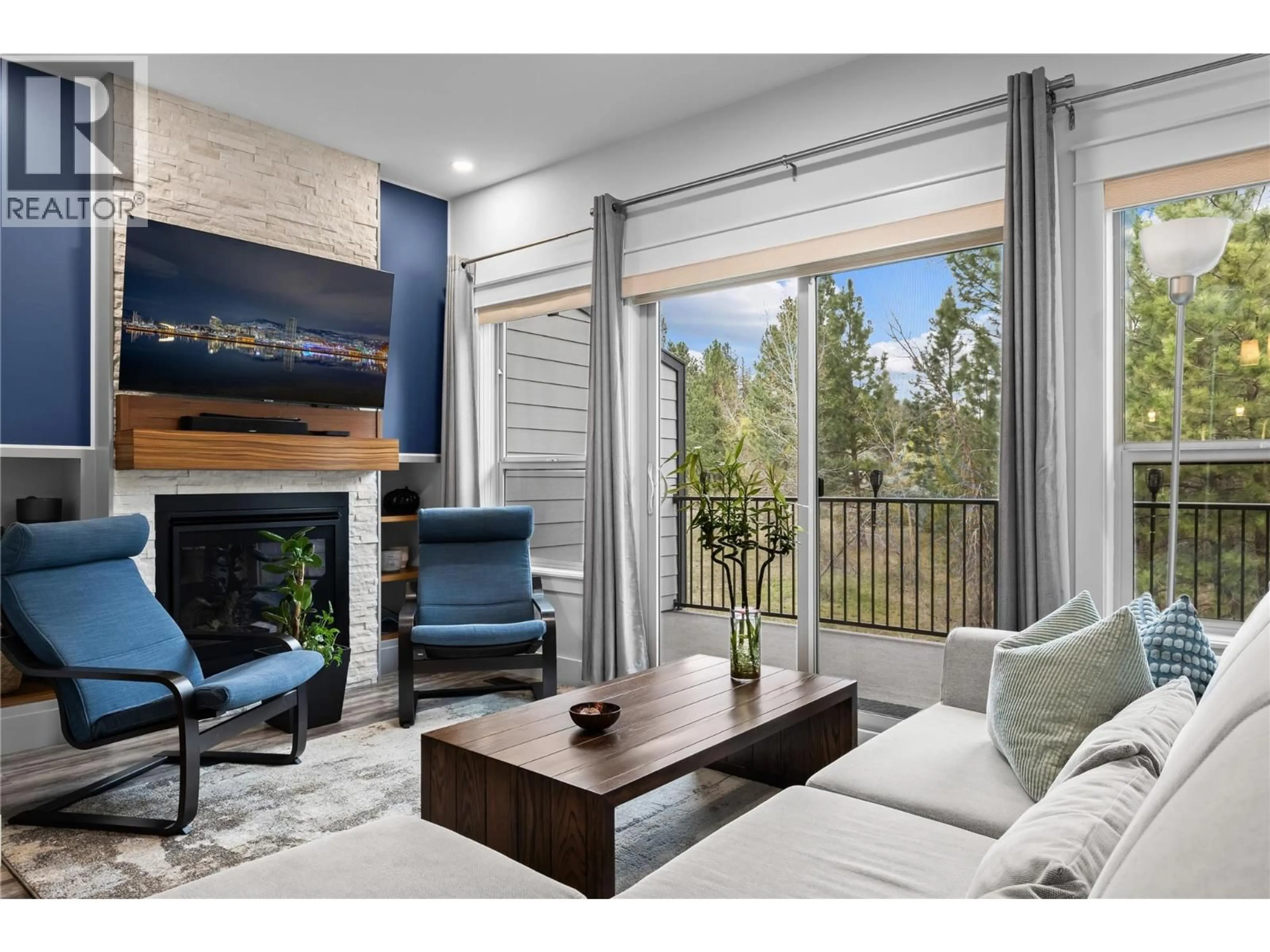 Living room with furniture, wood/laminate floor for 63 - 3359 COUGAR ROAD, West Kelowna British Columbia V4T3G1