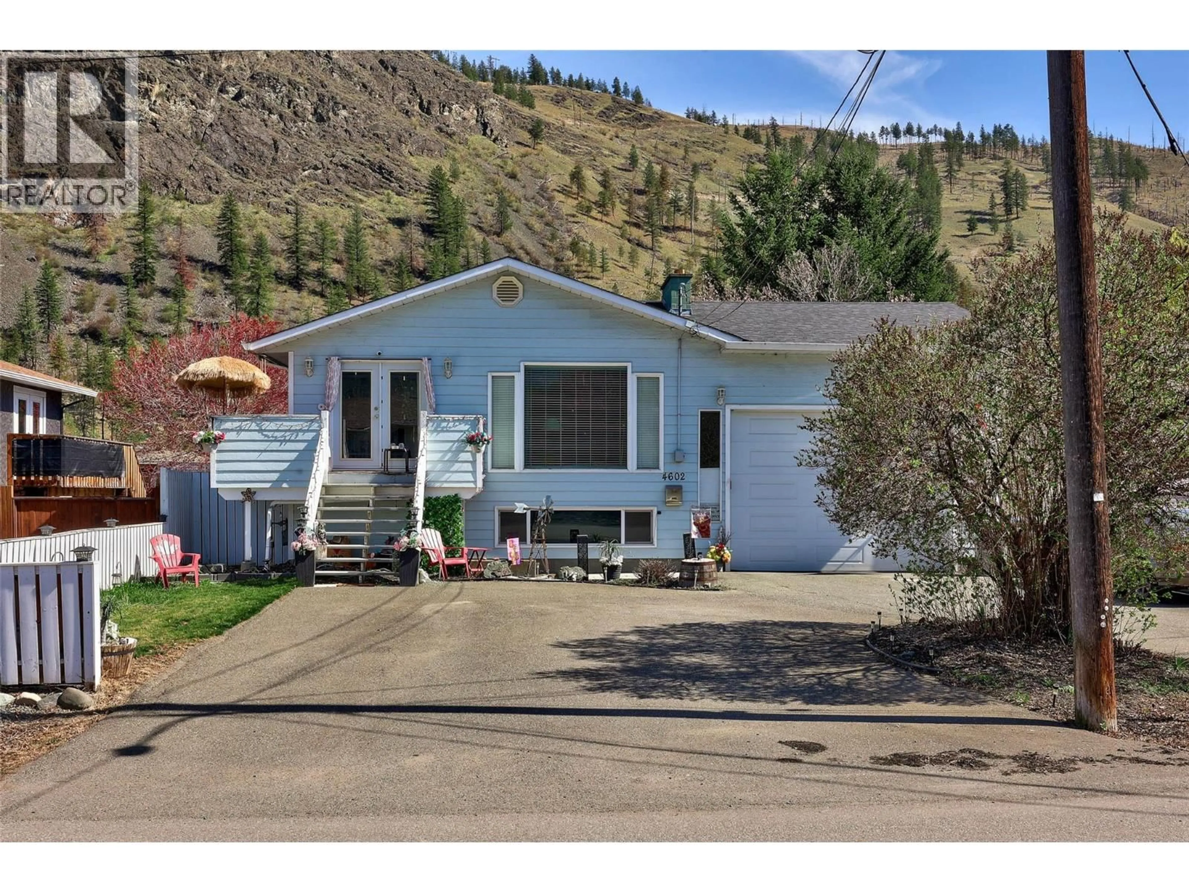 Home with vinyl exterior material, street for 4602 STRAWBERRY LANE, Kamloops British Columbia V2H1L6