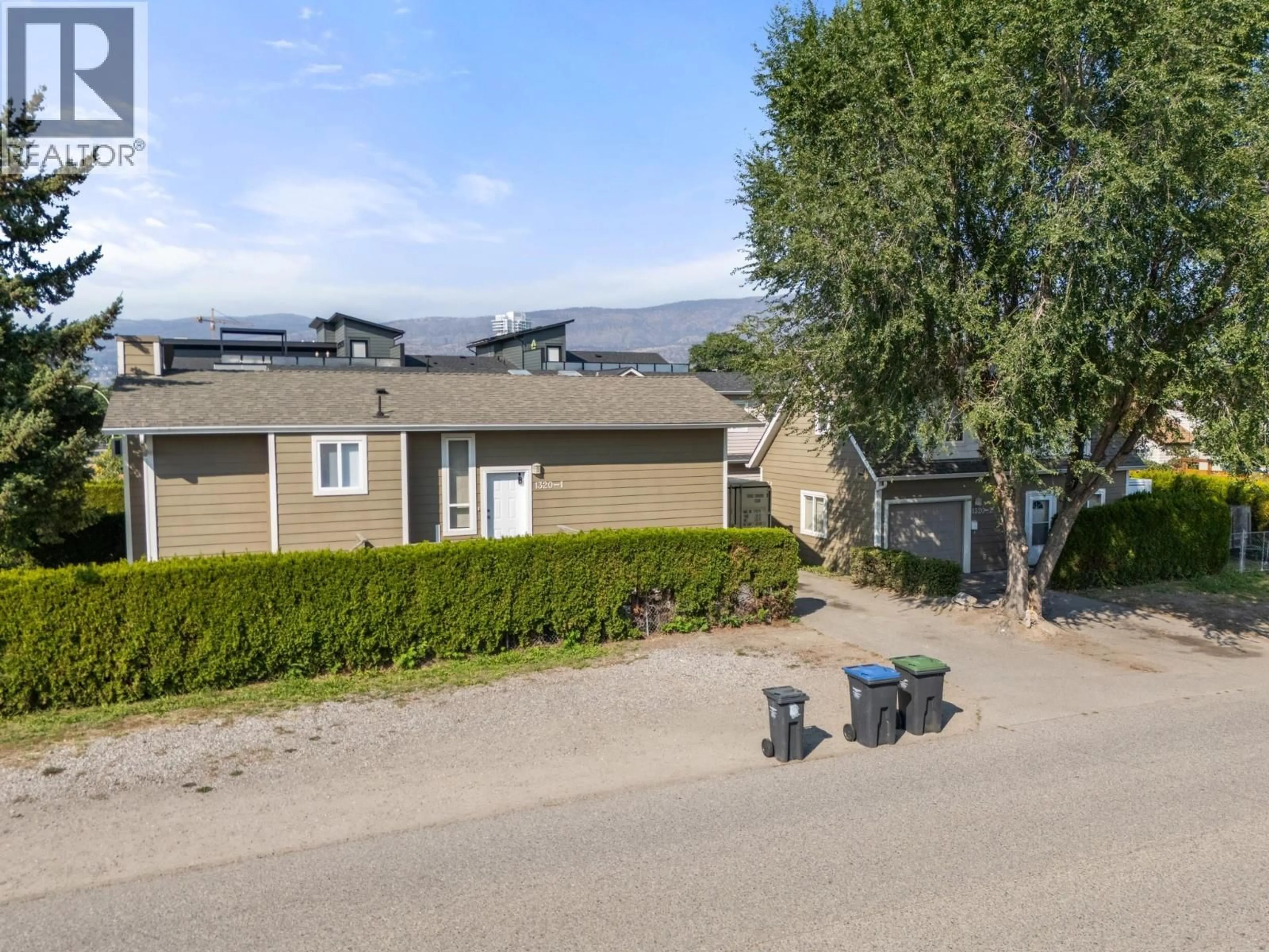 A pic from outside/outdoor area/front of a property/back of a property/a pic from drone, mountain view for 1320 GRAHAM STREET, Kelowna British Columbia V1Y9X7
