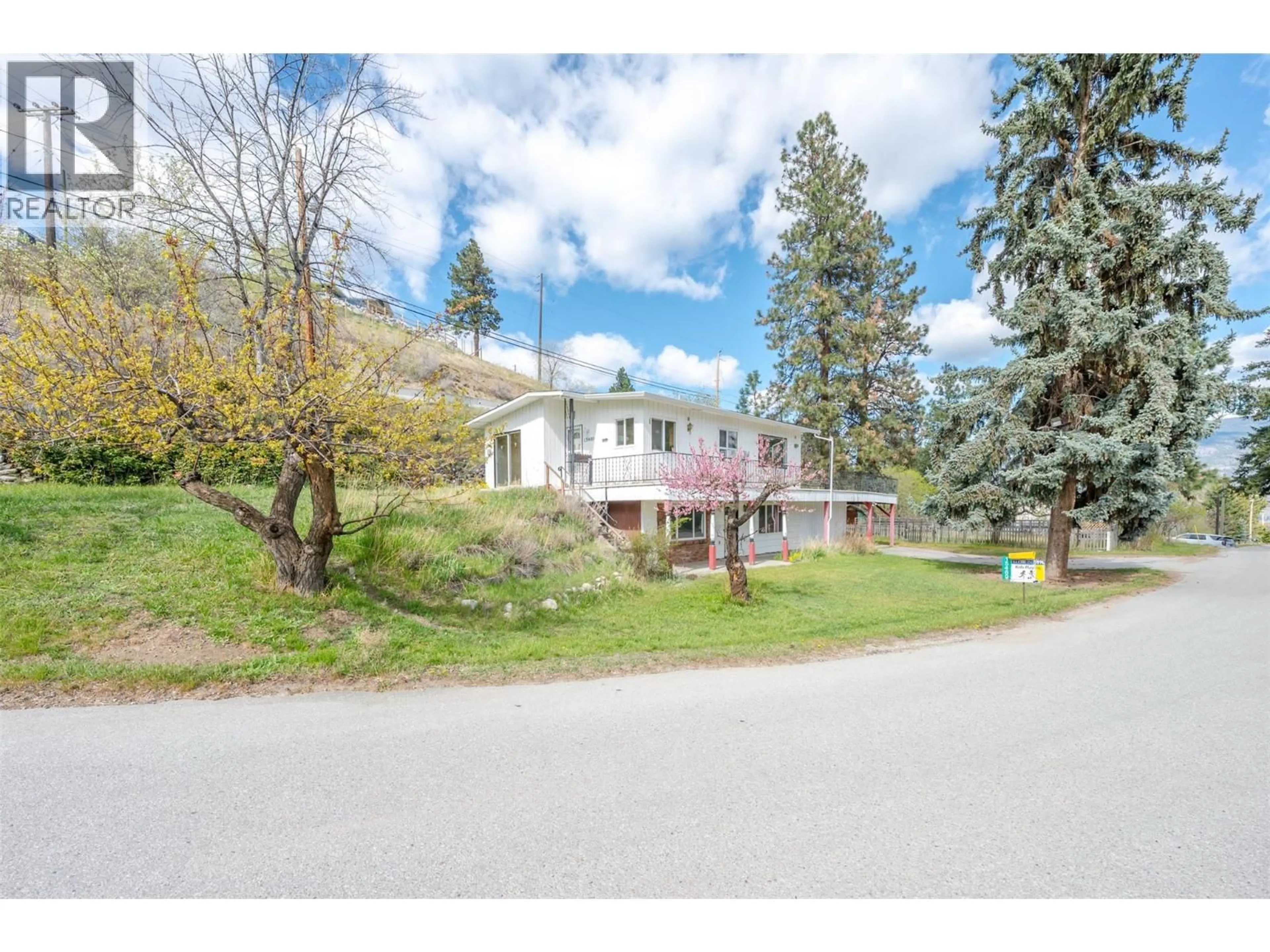 A pic from outside/outdoor area/front of a property/back of a property/a pic from drone, street for 15489 MELLOR ROAD, Summerland British Columbia V0H1Z6