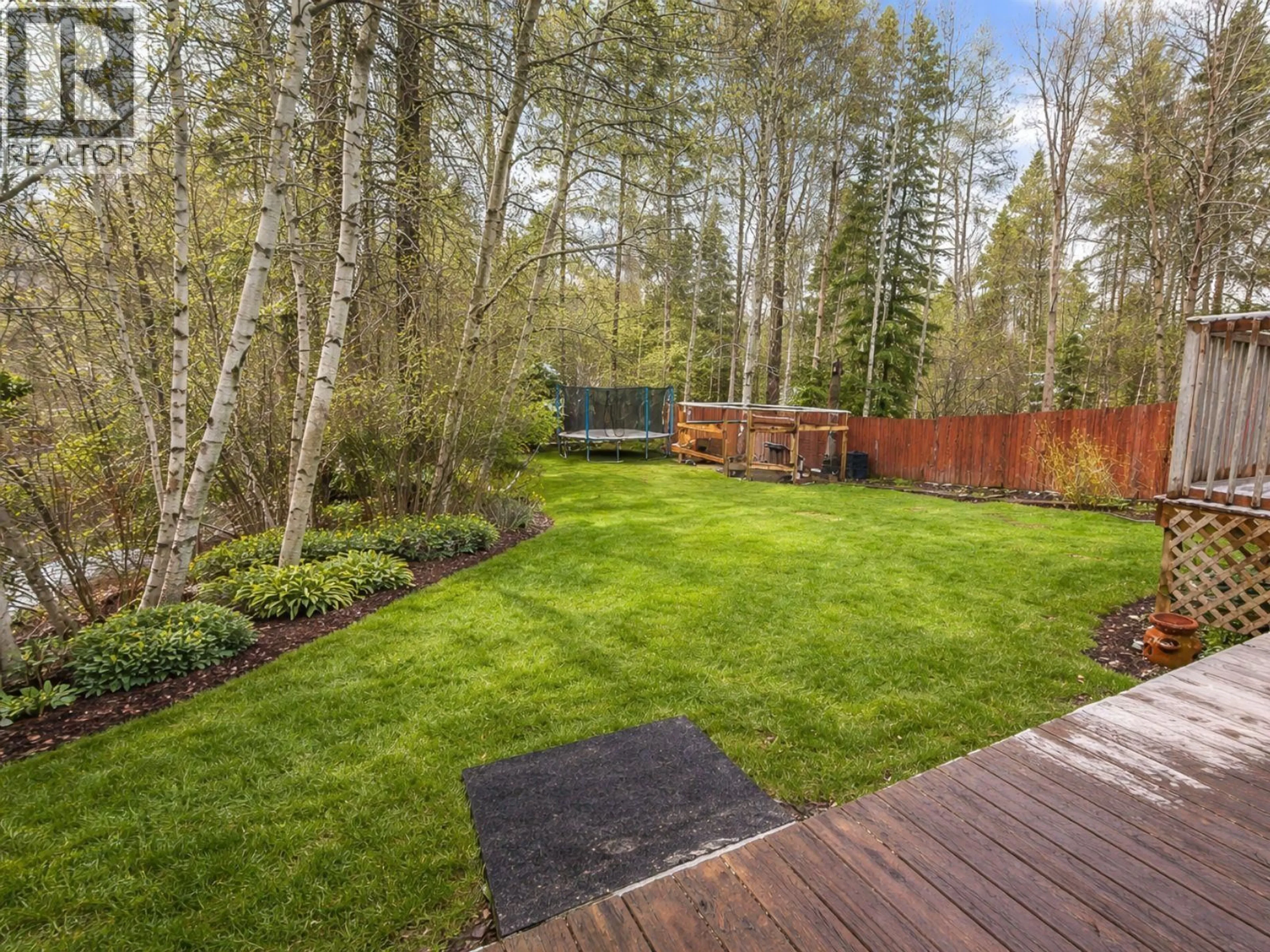 Patio, forest/trees view for 11 RIDGEMONT DRIVE, Fernie British Columbia V0B1M2