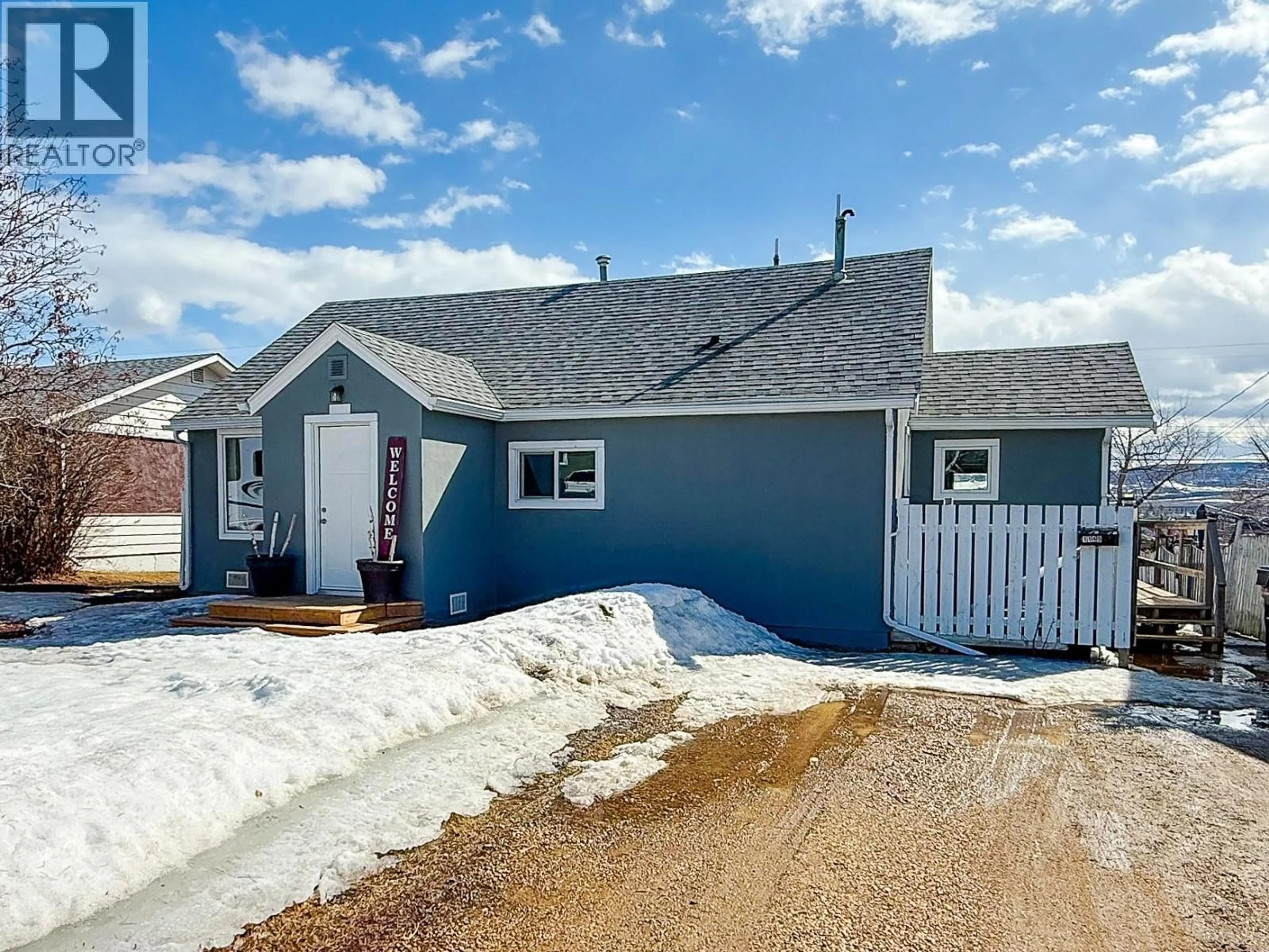 Home with vinyl exterior material, street for 1149 96A AVENUE, Dawson Creek British Columbia V1G1M9