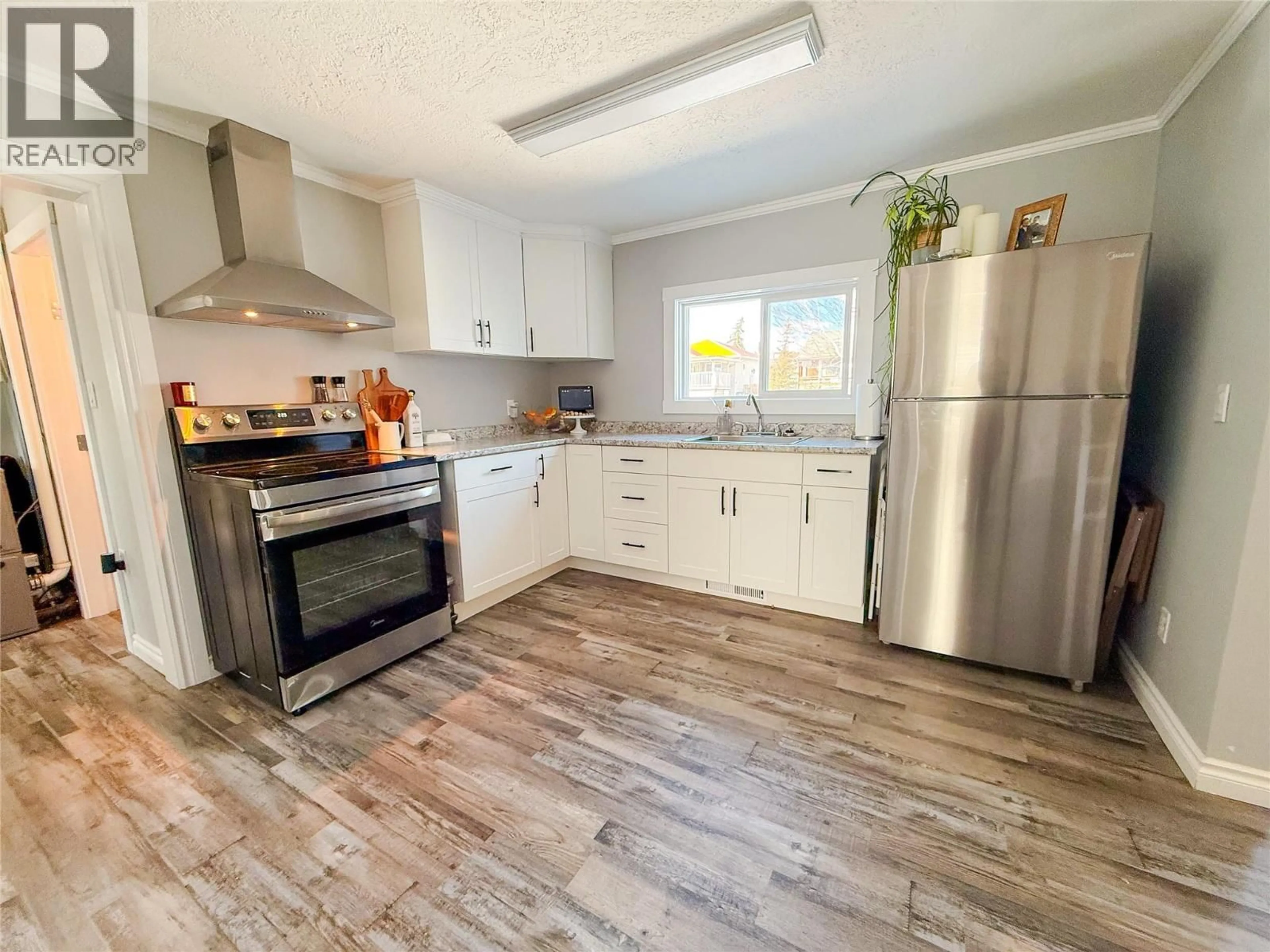 Open concept kitchen, unknown for 1149 96A AVENUE, Dawson Creek British Columbia V1G1M9