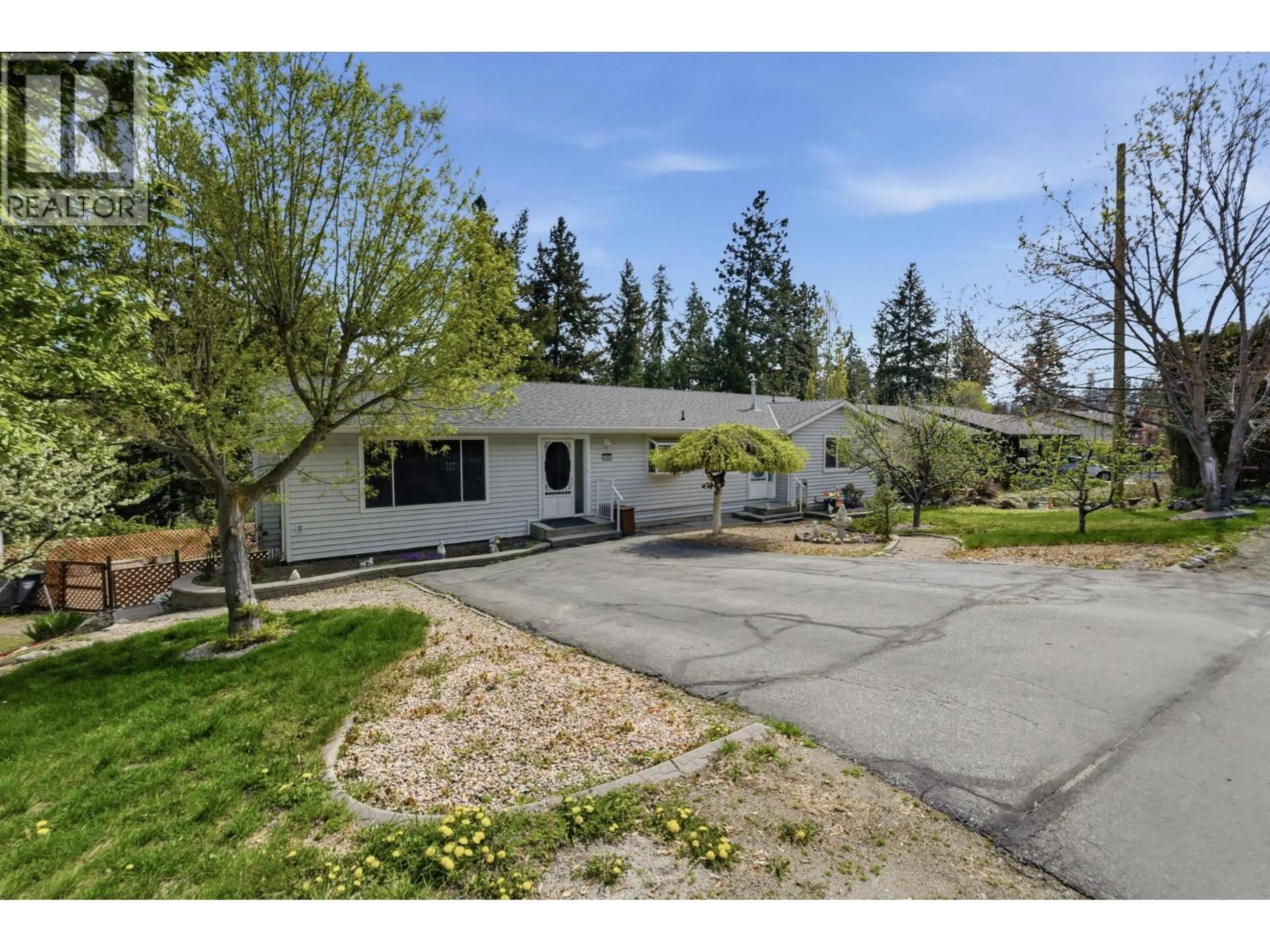 A pic from outside/outdoor area/front of a property/back of a property/a pic from drone, street for 3193 MCLEOD ROAD, West Kelowna British Columbia V4T1A6