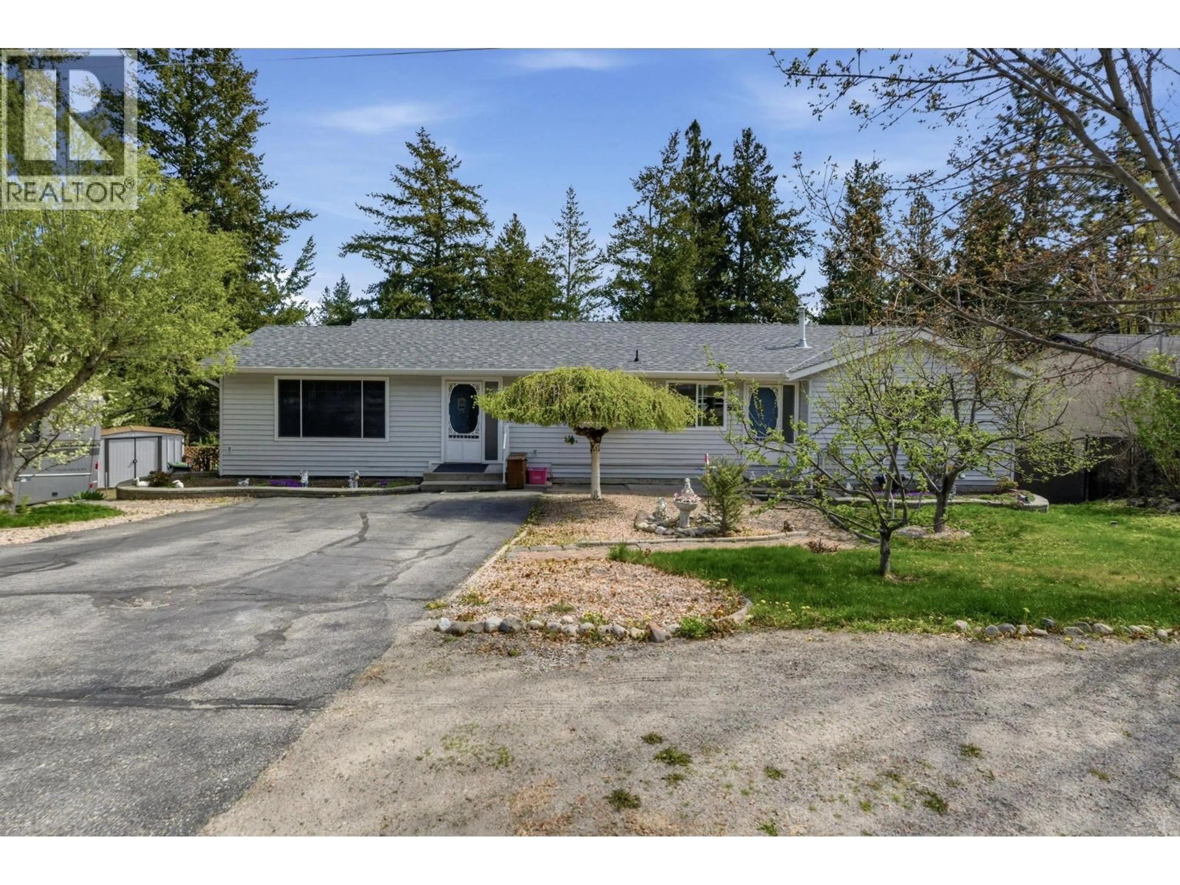 A pic from outside/outdoor area/front of a property/back of a property/a pic from drone, street for 3193 MCLEOD ROAD, West Kelowna British Columbia V4T1A6
