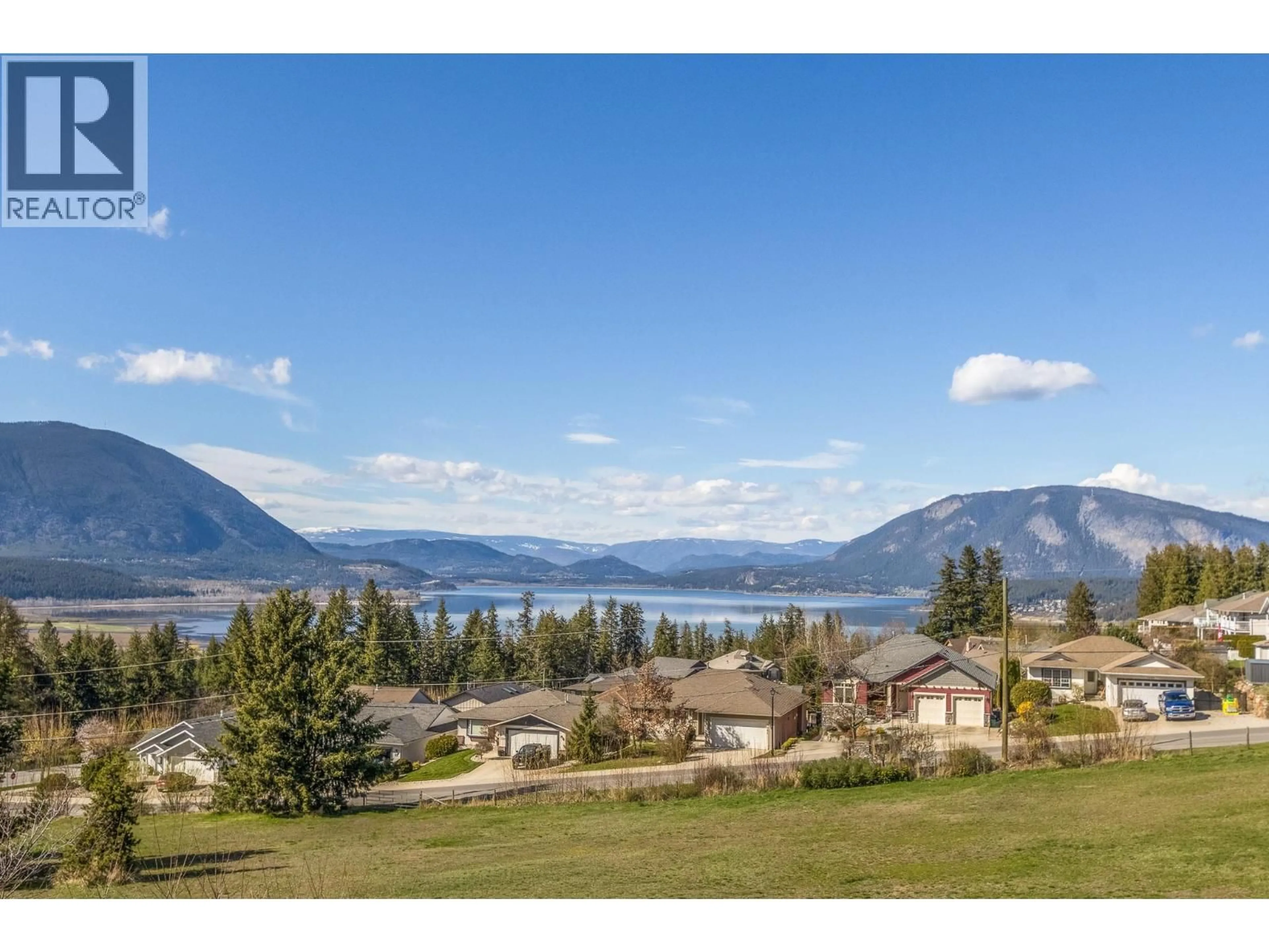 A pic from outside/outdoor area/front of a property/back of a property/a pic from drone, water/lake/river/ocean view for 1121 16 AVENUE SOUTHEAST, Salmon Arm British Columbia V1E2R5