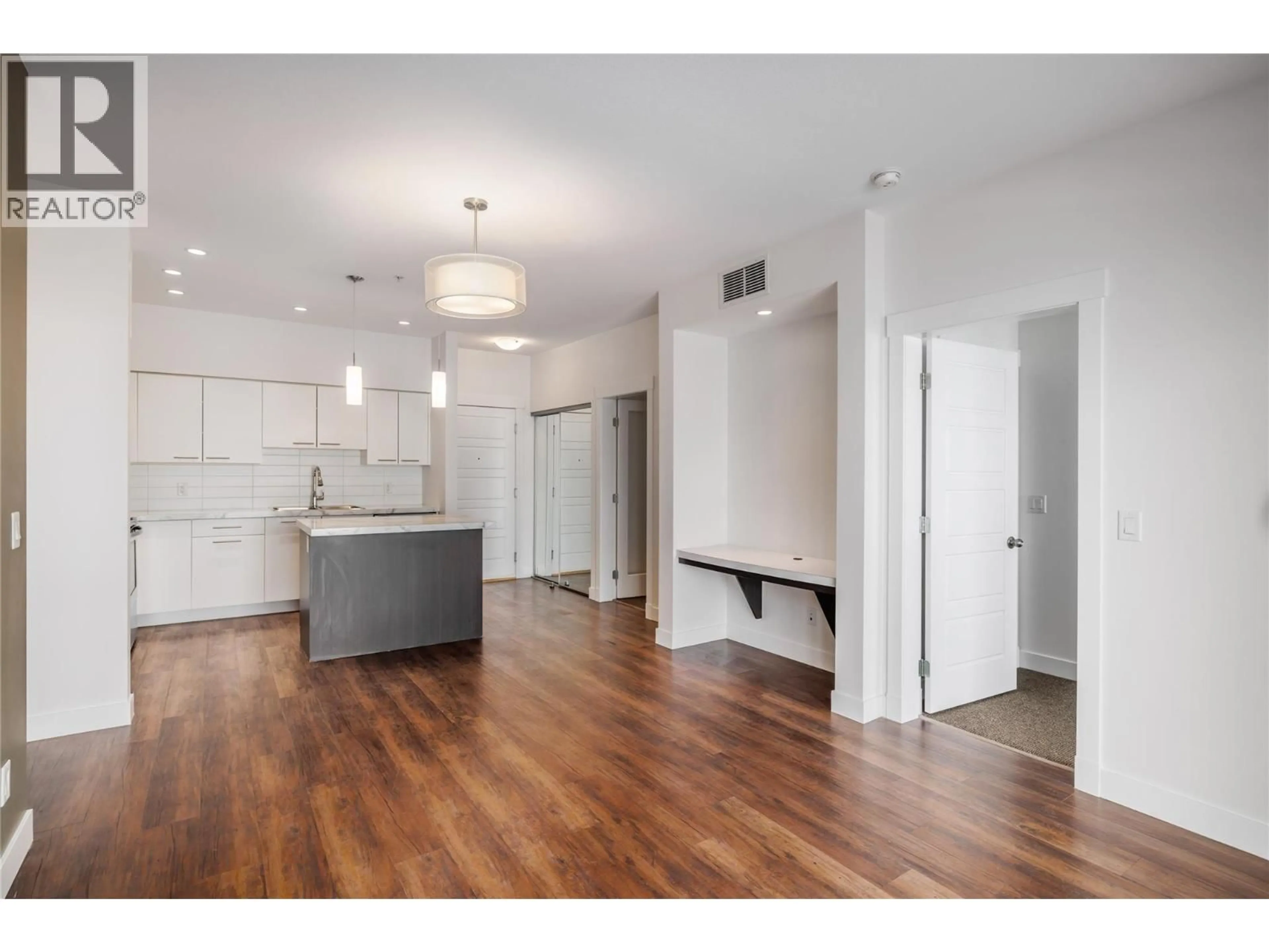 Open concept kitchen, unknown for 214 - 975 ACADEMY WAY, Kelowna British Columbia V1V3C8