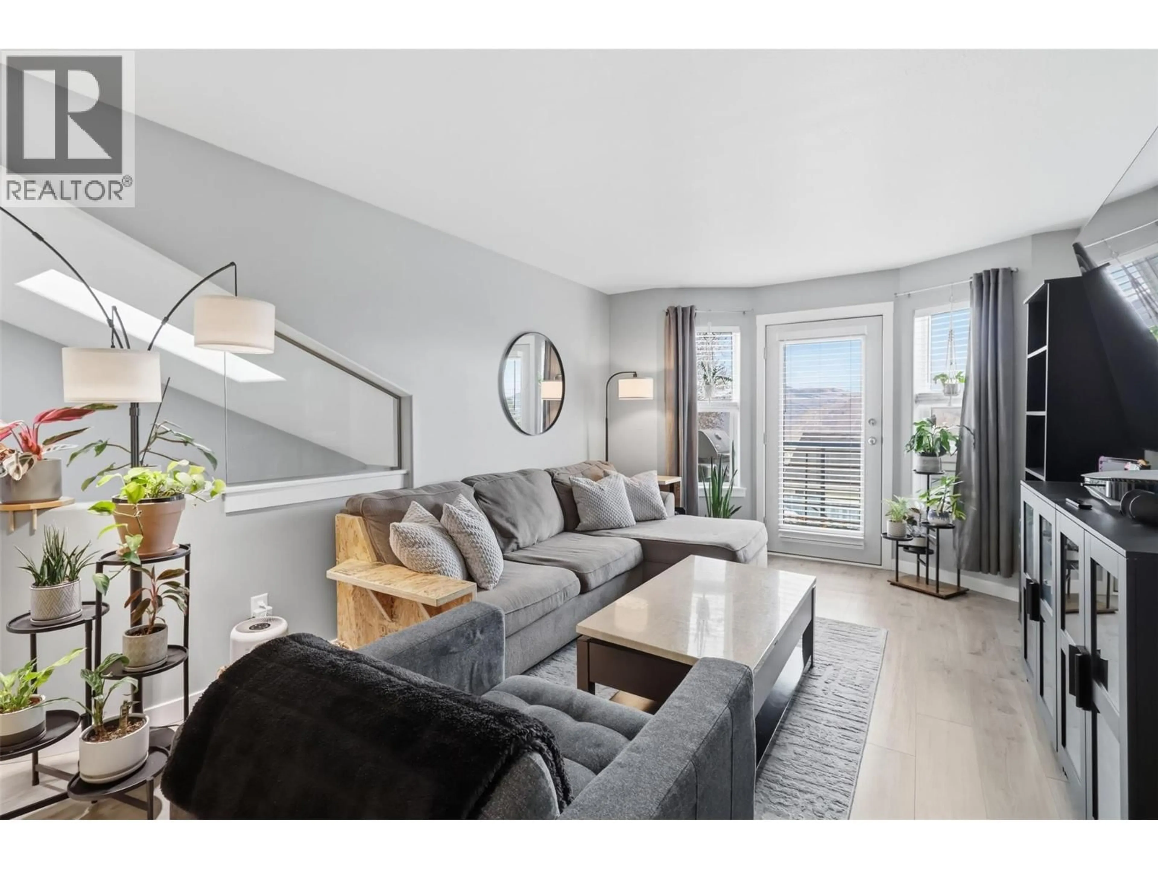 Living room with furniture, wood/laminate floor for 4 - 245 WHISTLER DRIVE, Kamloops British Columbia V2E1W8