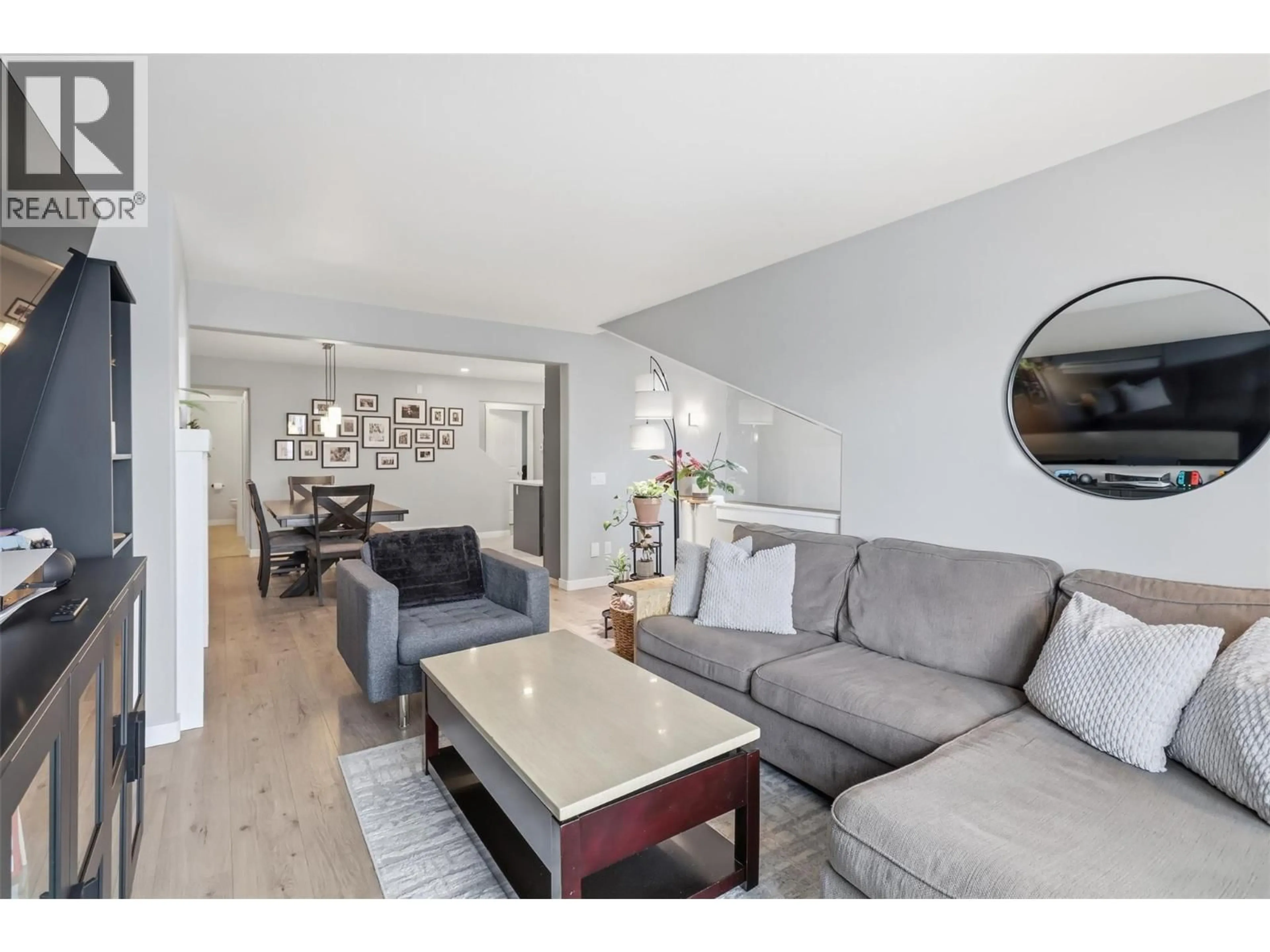 Living room with furniture, wood/laminate floor for 4 - 245 WHISTLER DRIVE, Kamloops British Columbia V2E1W8