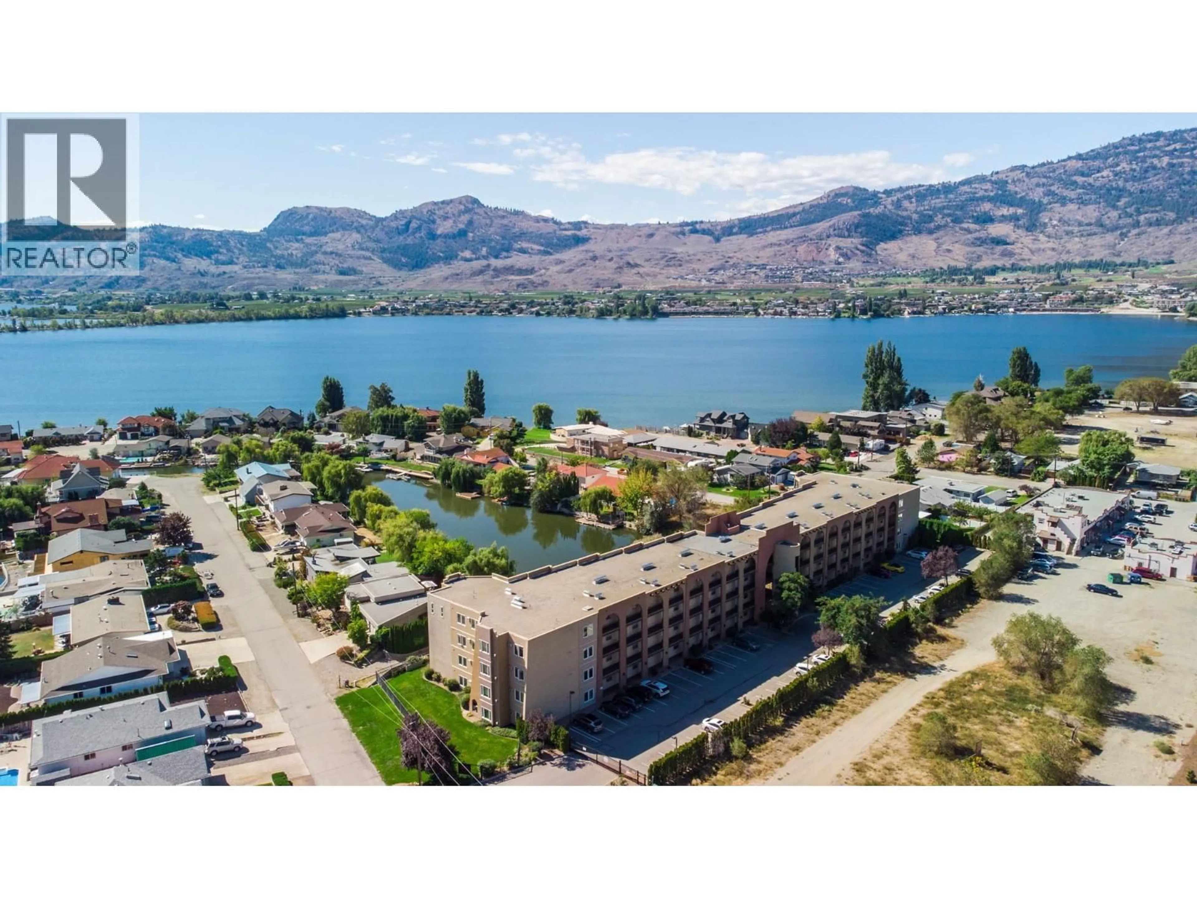 A pic from outside/outdoor area/front of a property/back of a property/a pic from drone, water/lake/river/ocean view for 204 - 15 SOLANA KEY COURT, Osoyoos British Columbia V0H1V3