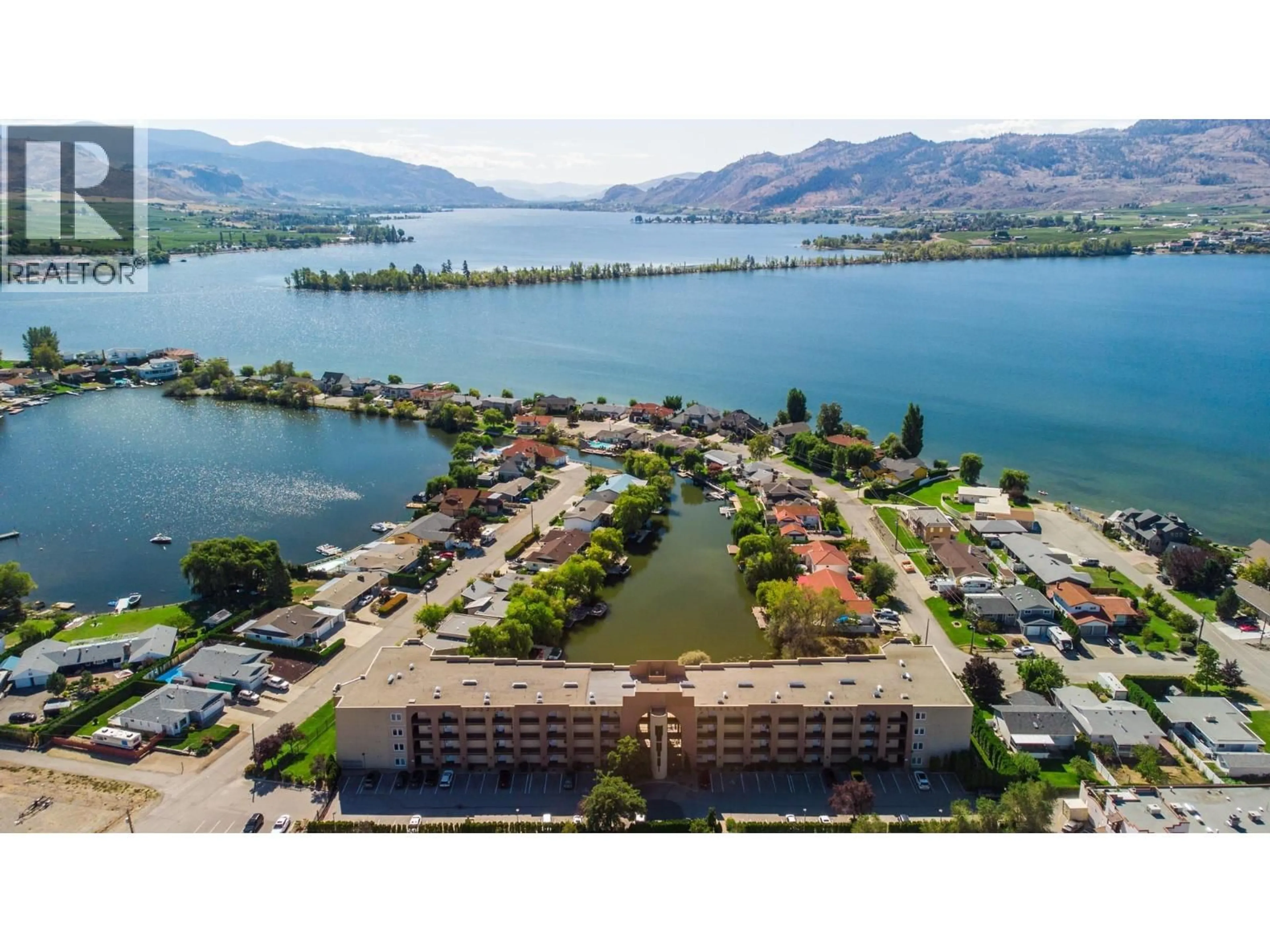 A pic from outside/outdoor area/front of a property/back of a property/a pic from drone, water/lake/river/ocean view for 204 - 15 SOLANA KEY COURT, Osoyoos British Columbia V0H1V3