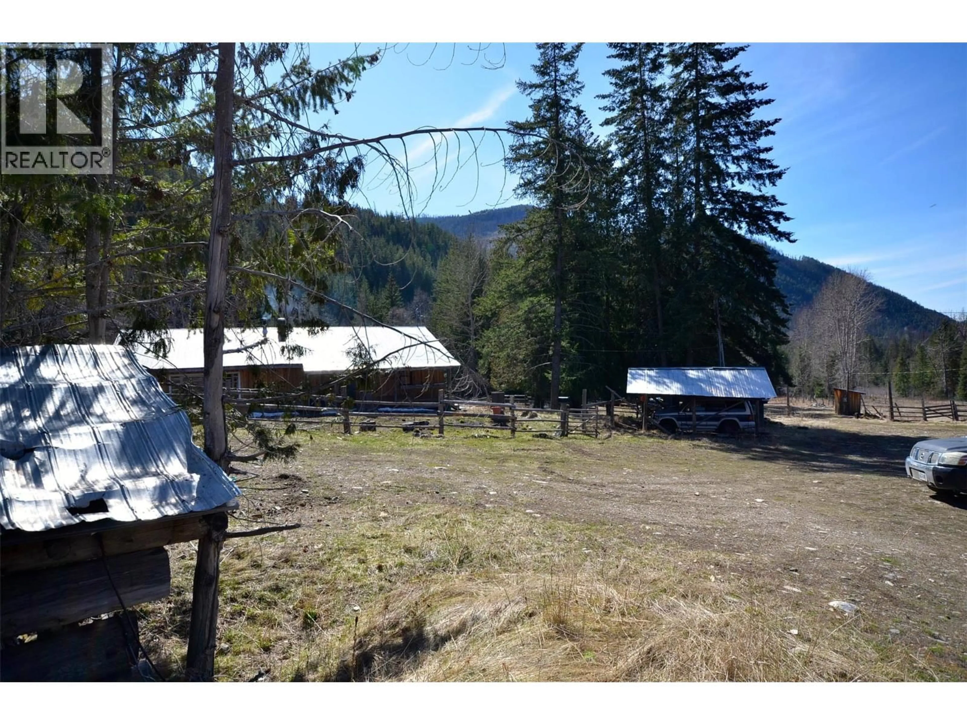 A pic from outside/outdoor area/front of a property/back of a property/a pic from drone, mountain view for 1538 CREIGHTON VALLEY ROAD, Lumby British Columbia V0E2G1
