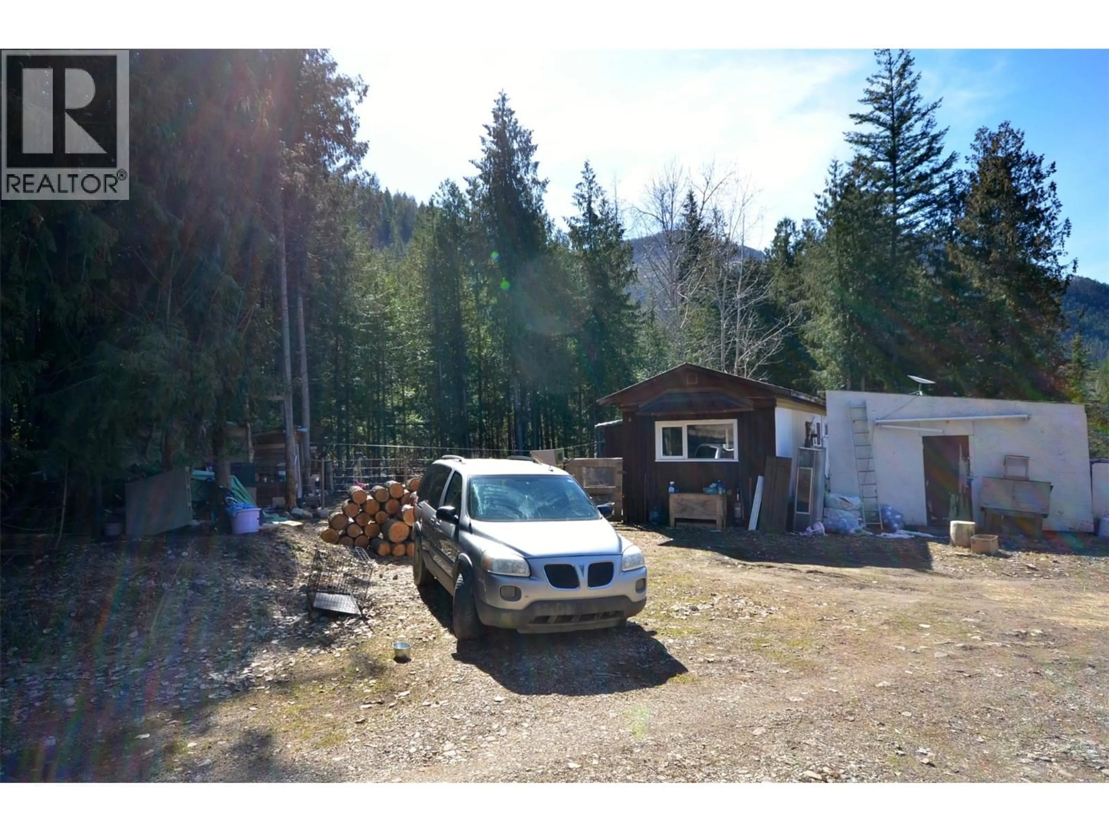 A pic from outside/outdoor area/front of a property/back of a property/a pic from drone, forest/trees view for 1538 CREIGHTON VALLEY ROAD, Lumby British Columbia V0E2G1